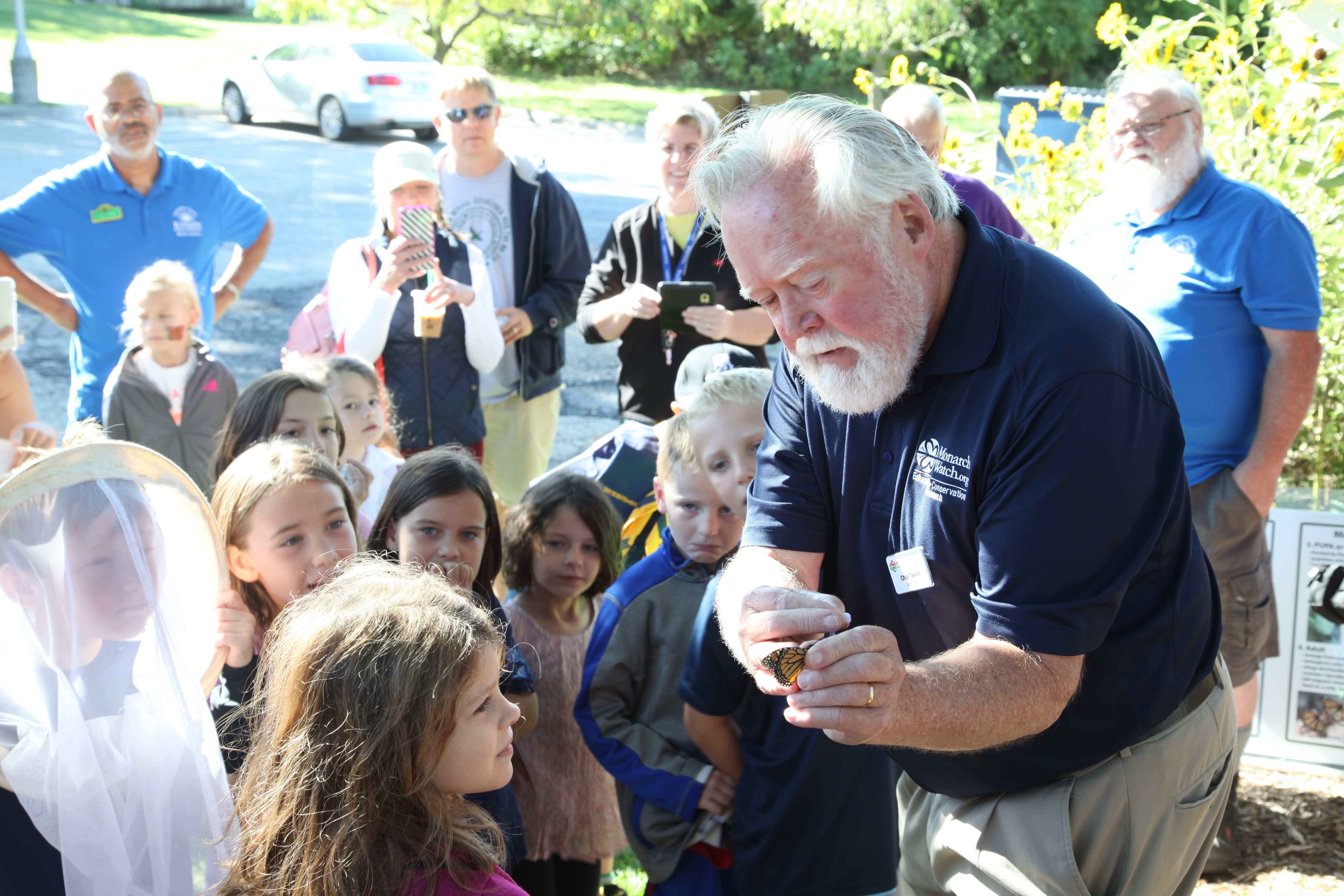 Chip and children at Monarch Watch event