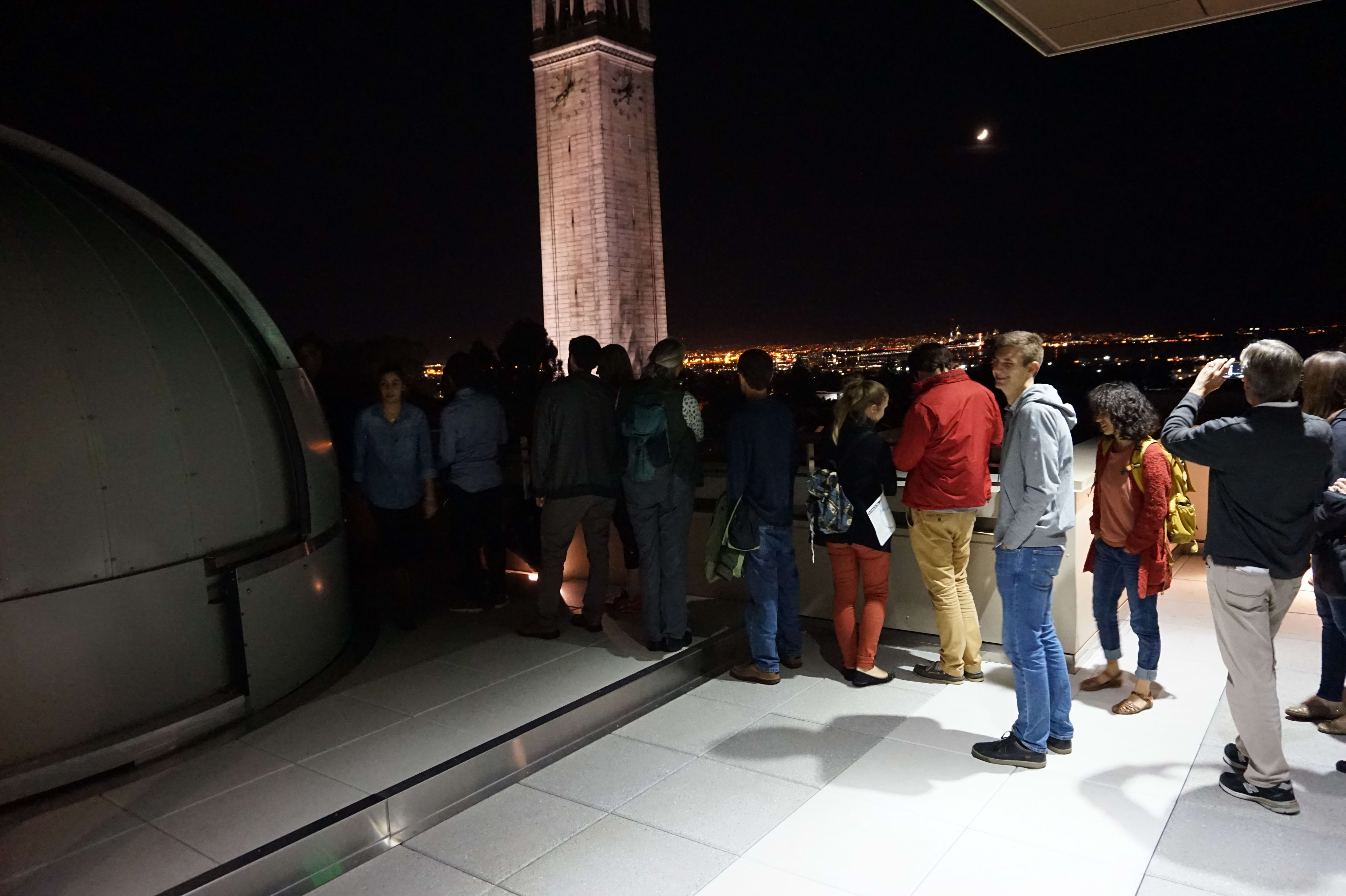 Visitors waiting to stargaze through the Campbell Hall telescope