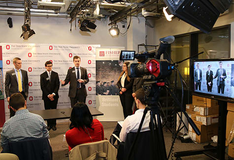 Three students are interviewed on a camera