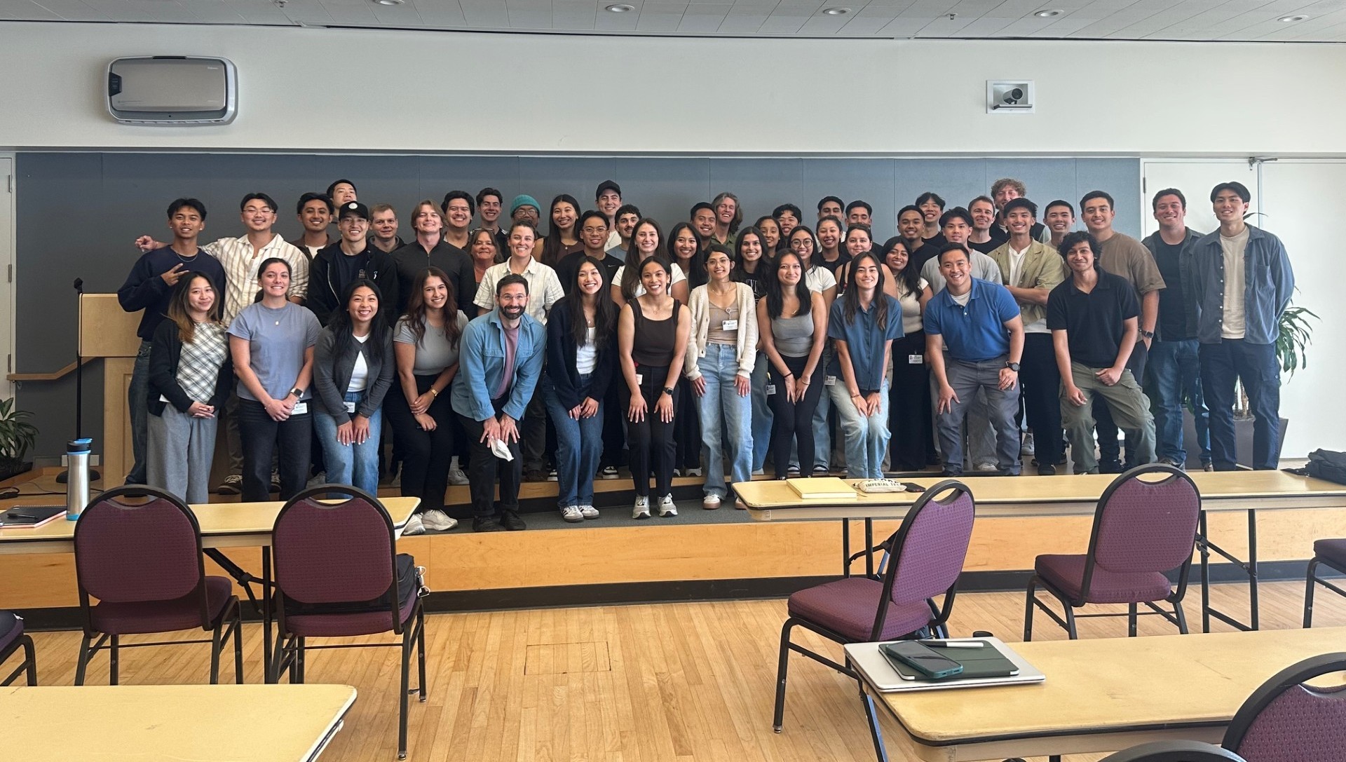 Group of physical therapy students gathered in a classroom.