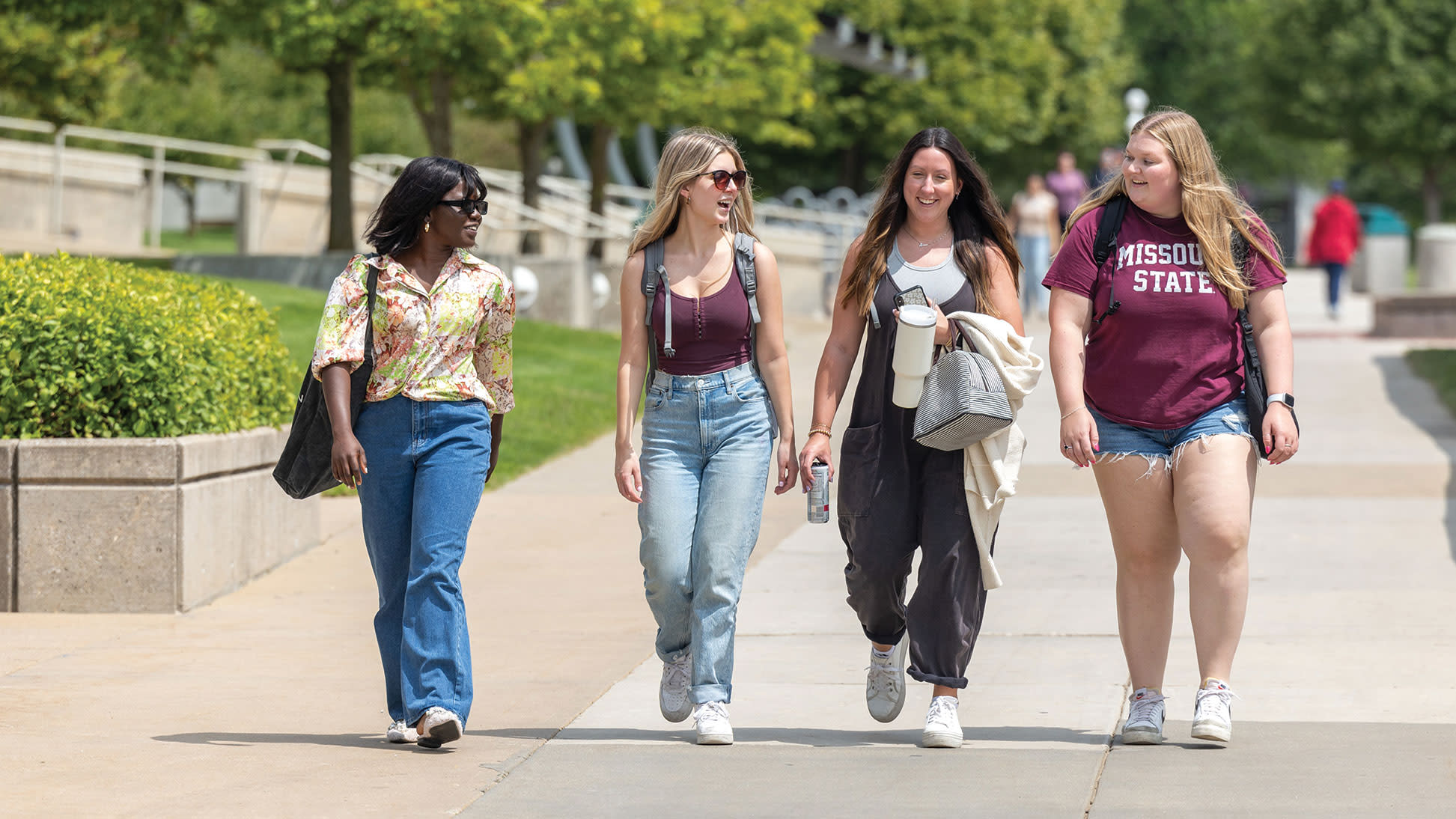 Three students walking on the Missouri State campus