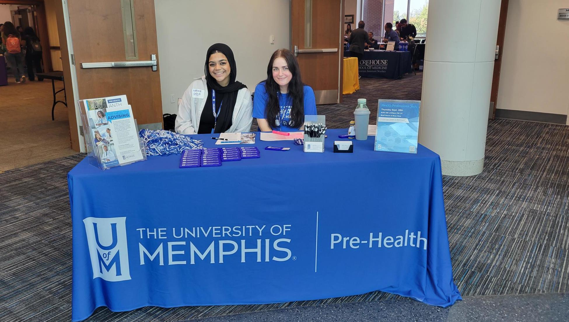 Students hosting the Pre-Health Memphis table during the Health Professions fair