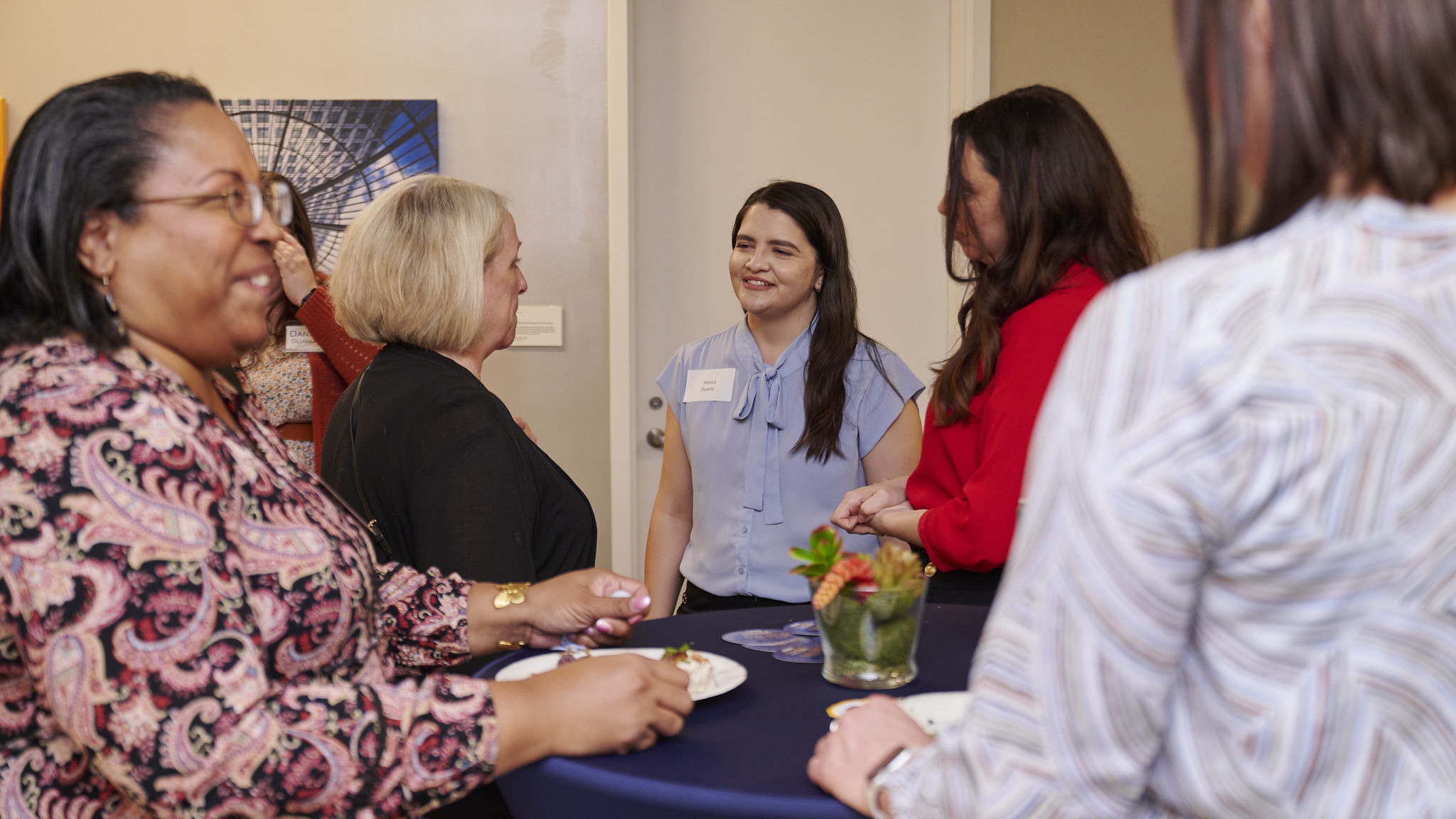 Students and alum mingling at Lumberjacks Thrive Career Mixer
