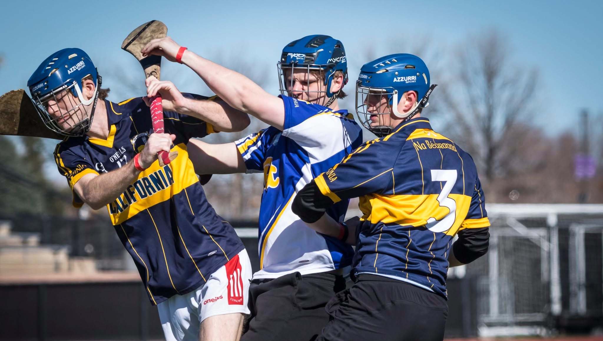 Teammates battling for possession of the ball