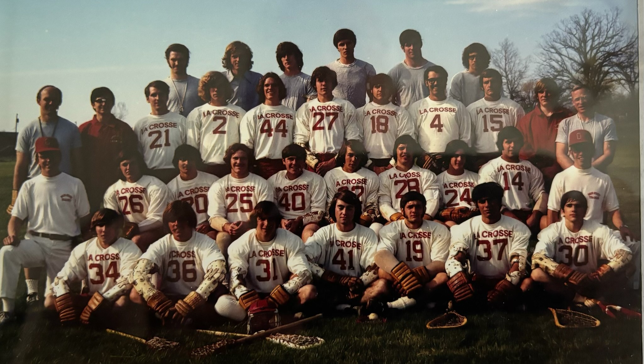 Black and white team photo of a past Ohio State Men's Lacrosse team in Ohio Stadium