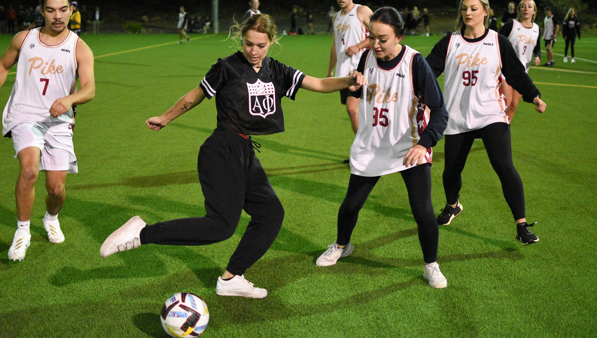 Students playing soccer at South fields