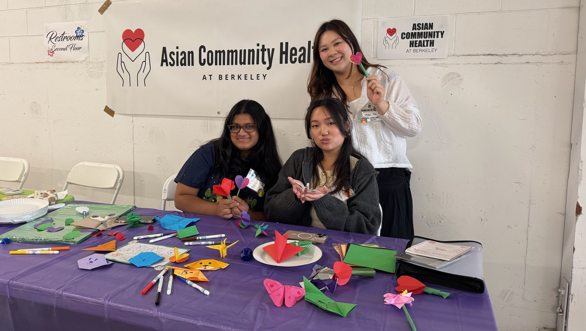 Volunteers leading craft activities at J-Sei Family Night Event