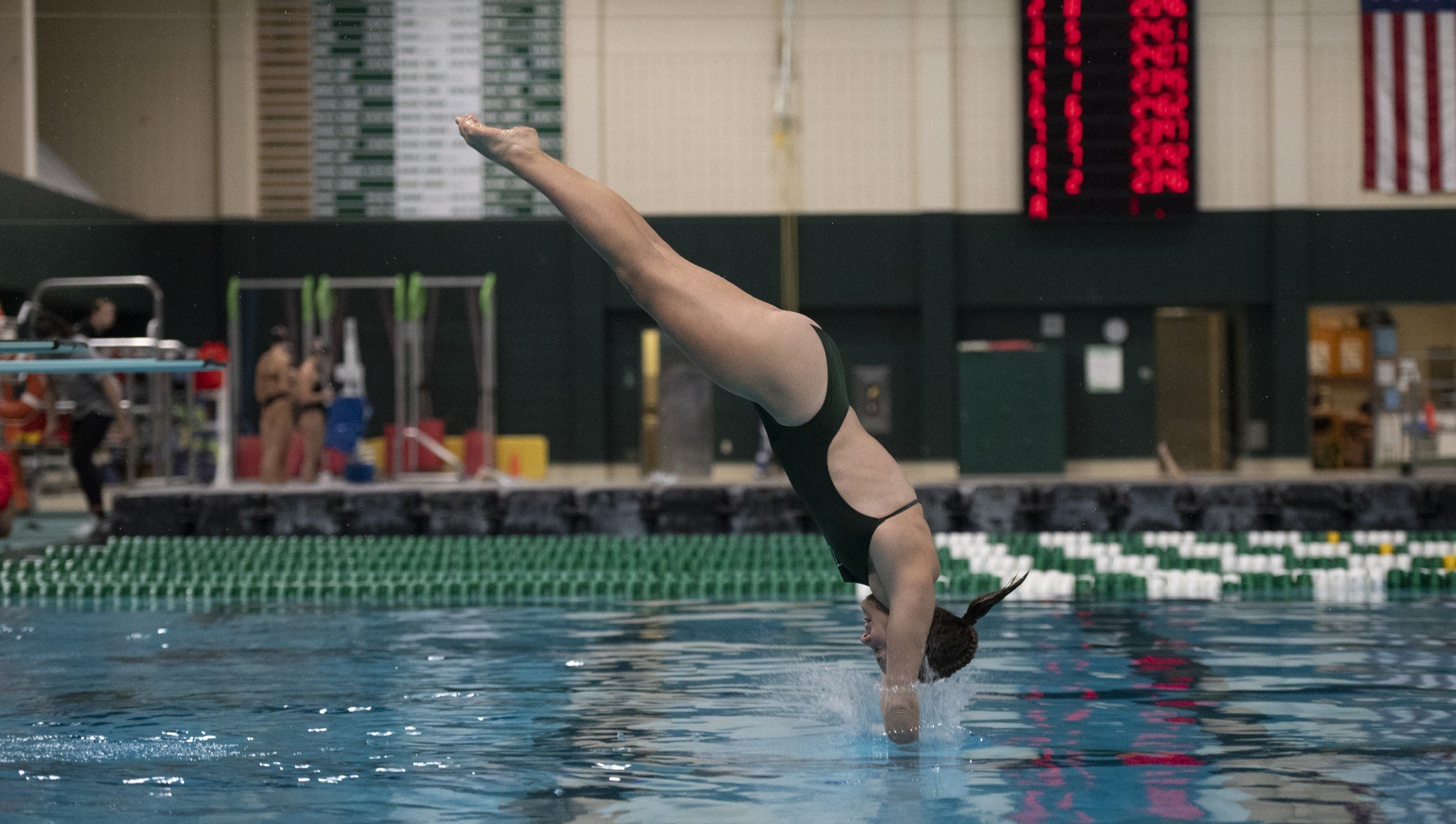 OHIO diver completes her trick and re-enters the water!
