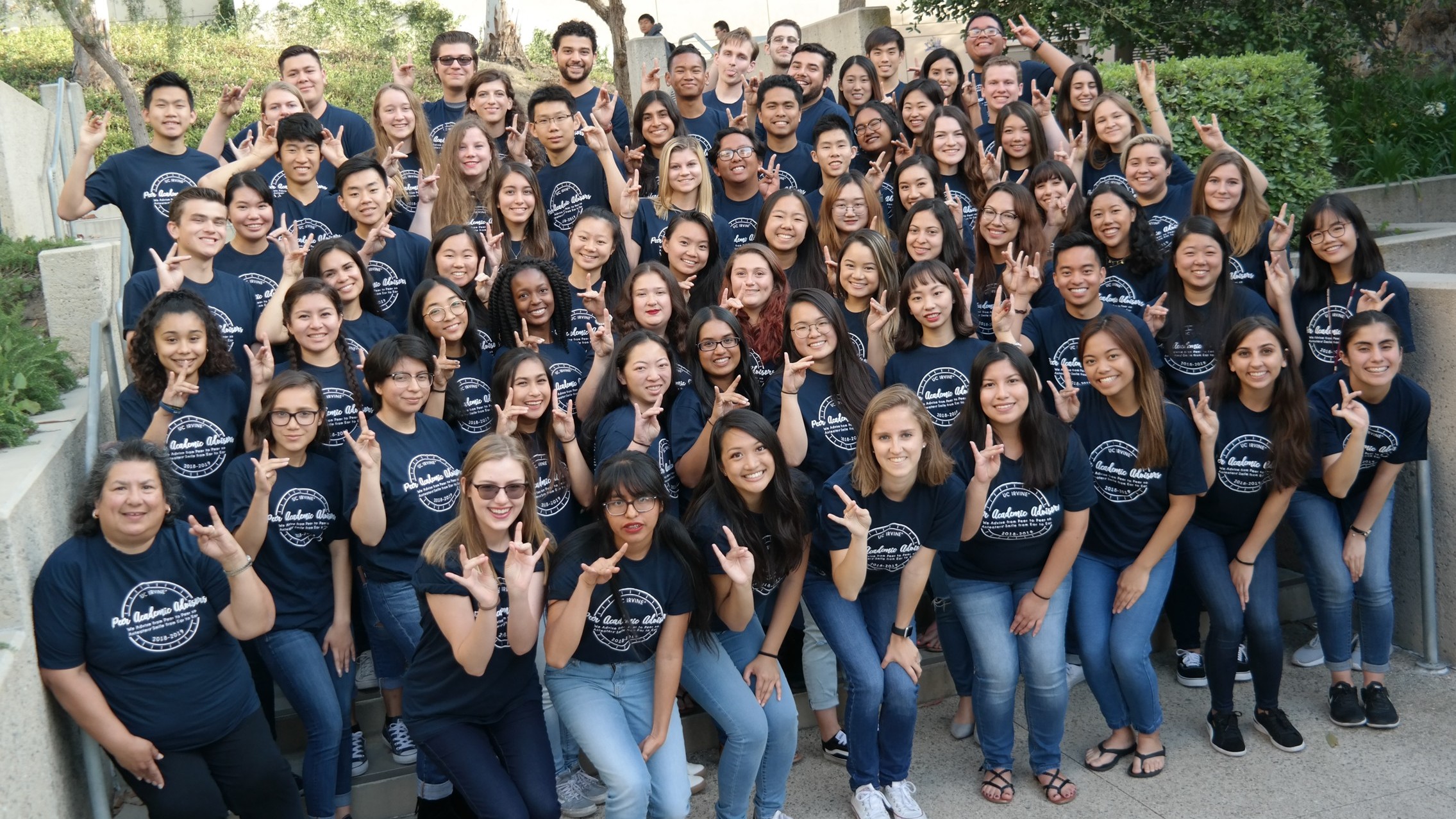 2018-19 PAAs group photo with all members holding the "zot" hand sign