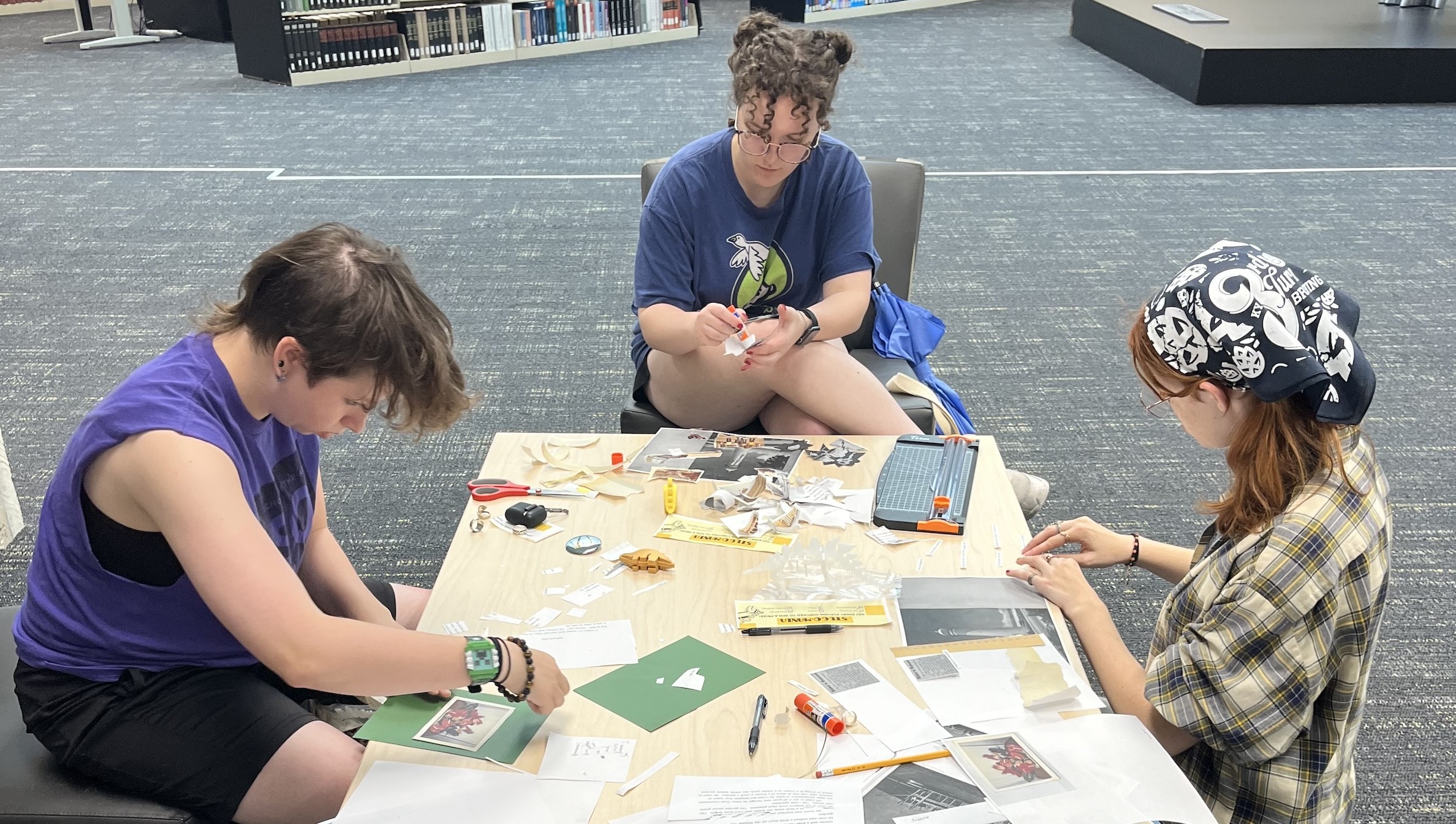 Students creating their own zines during Stego-Mania, fall 2024