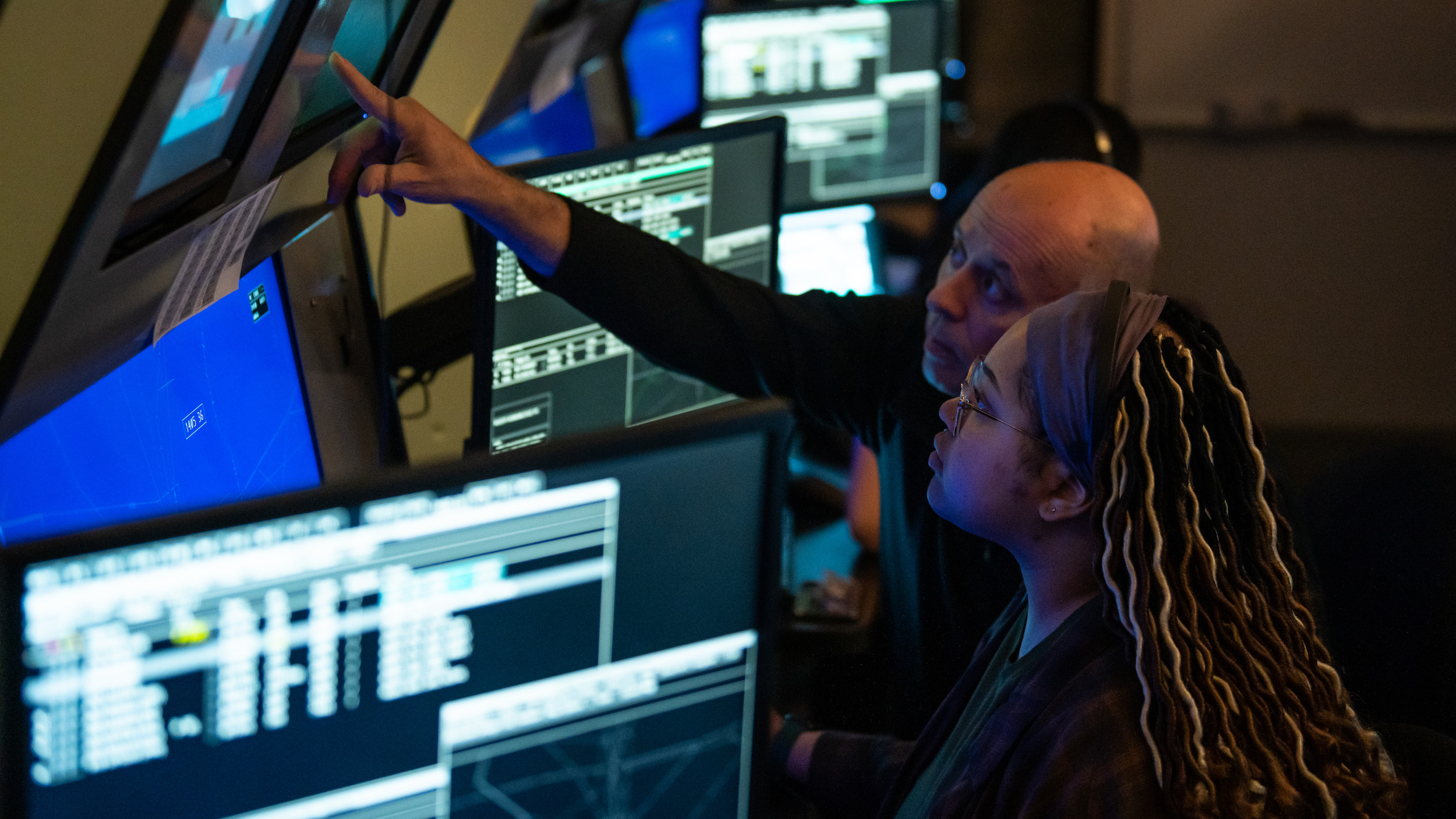 Air Traffic Control student and professor at CTC looking at screens