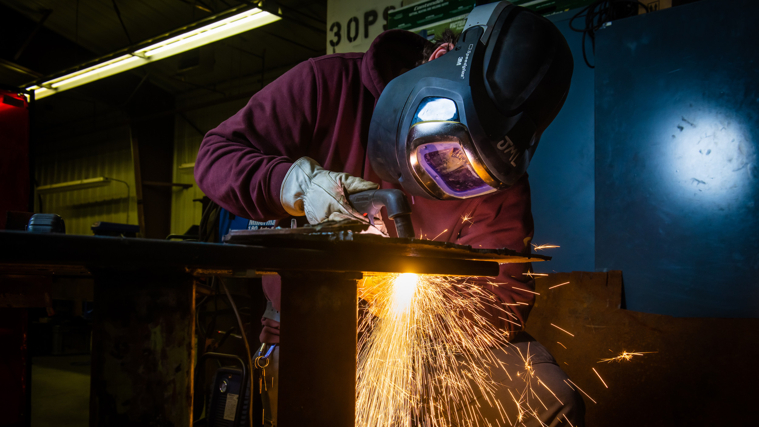 PWSC Millright class, welding student with beautiful sparks flying