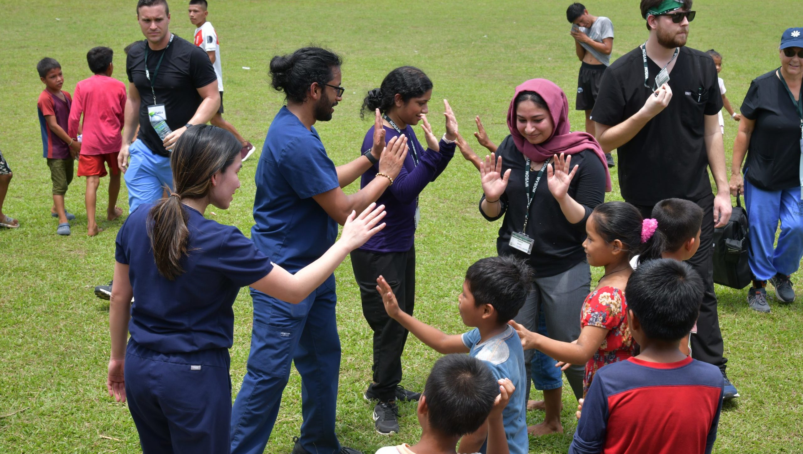 WVSOM DOCare students meeting the children from the village