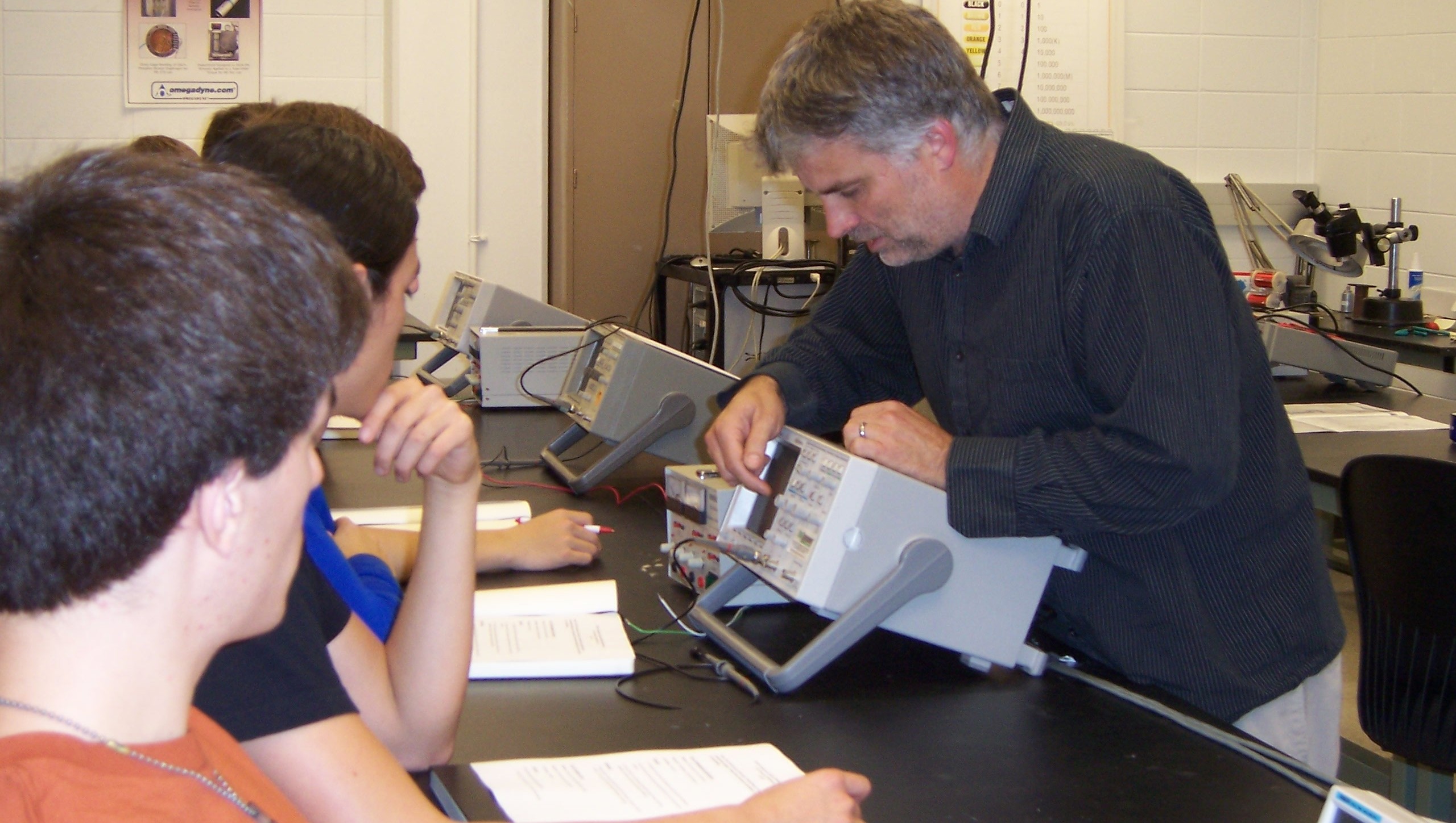 Joe West with students in the lab