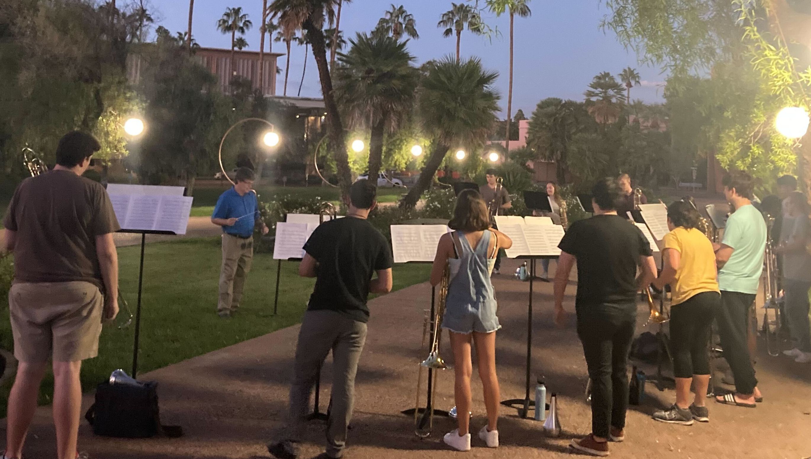 The trombone choir rehearsing outside of Gammage Auditorium.