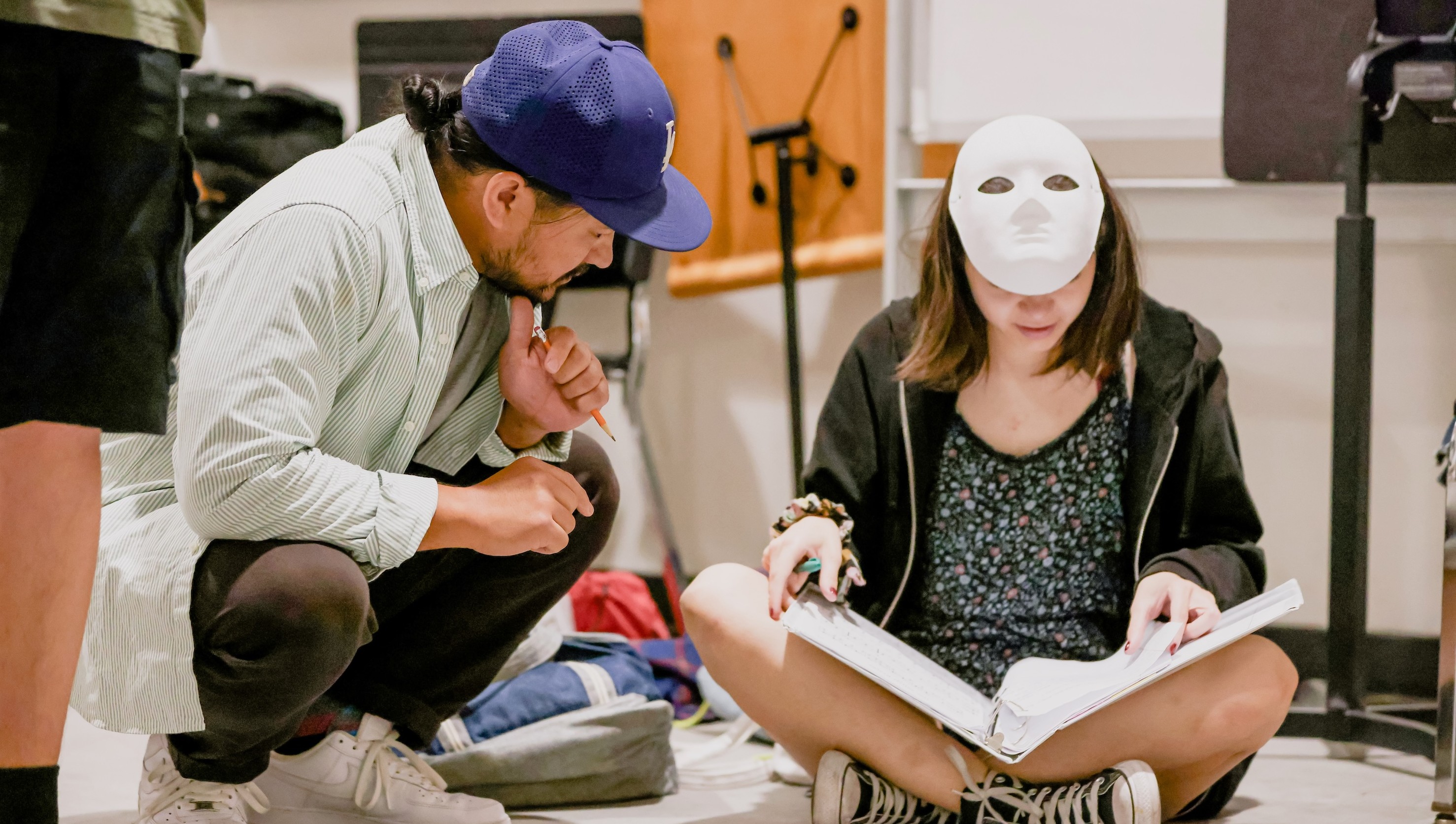 Ed Refuerzo works with an advanced student in Acting Level III