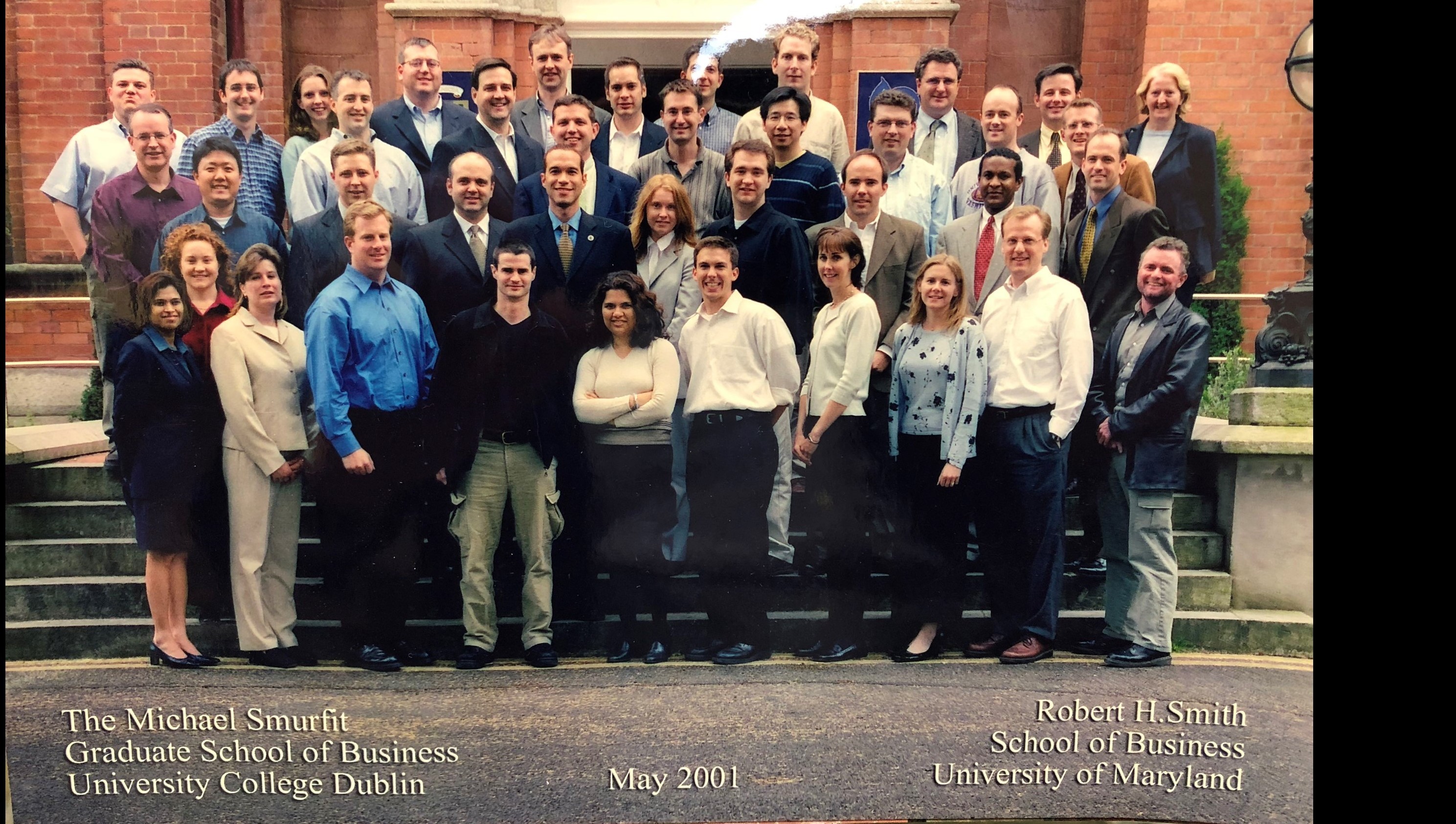 Eric Cranford & Scotty Lamana with their MBA Cohort (2nd Row, Left)