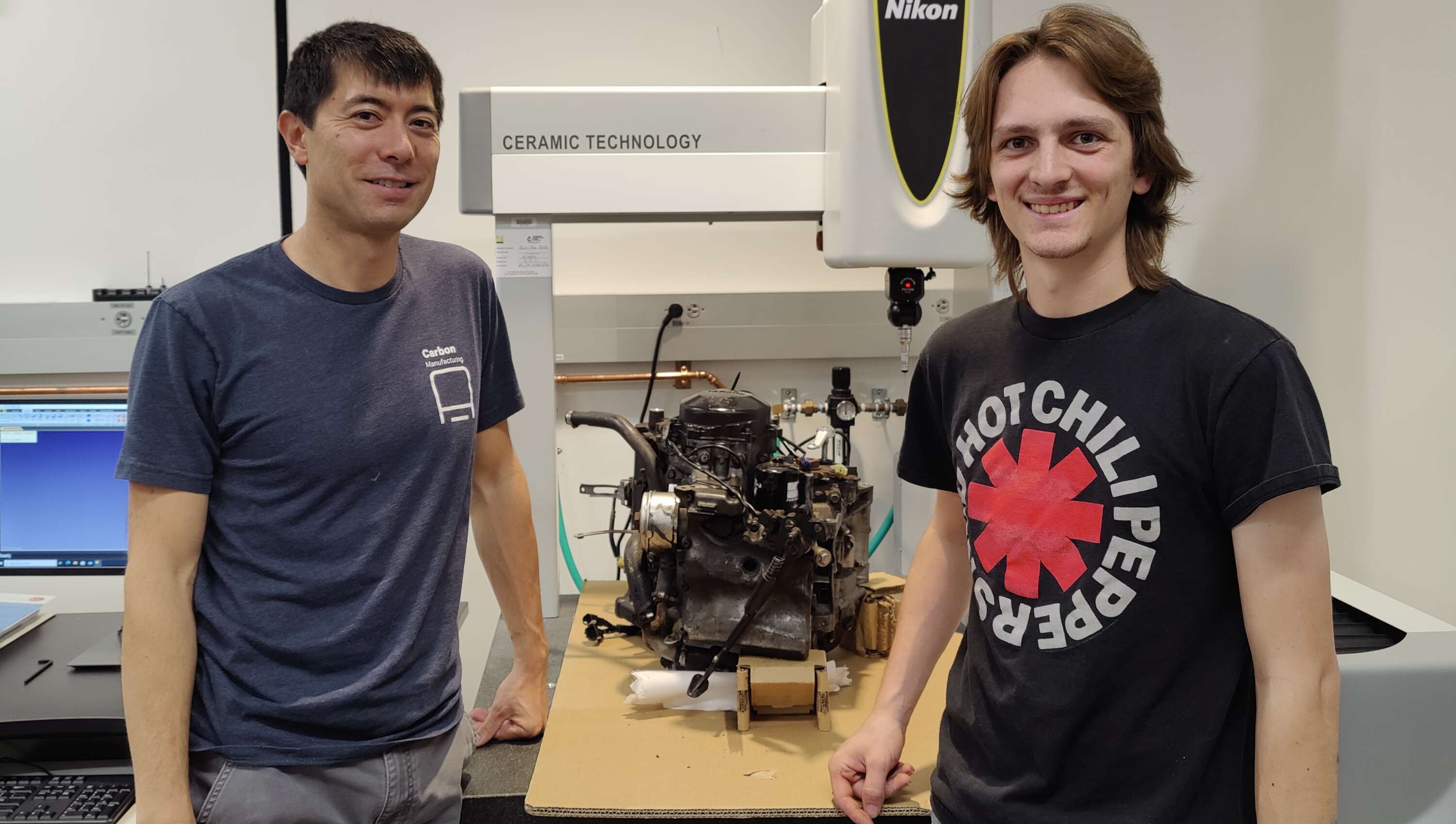 Cade at the the Lab using the Nikon CMM to measure the engine
