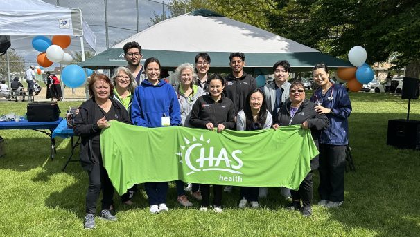 Student volunteers at a community outreach event in collaboration with CHAS Health.