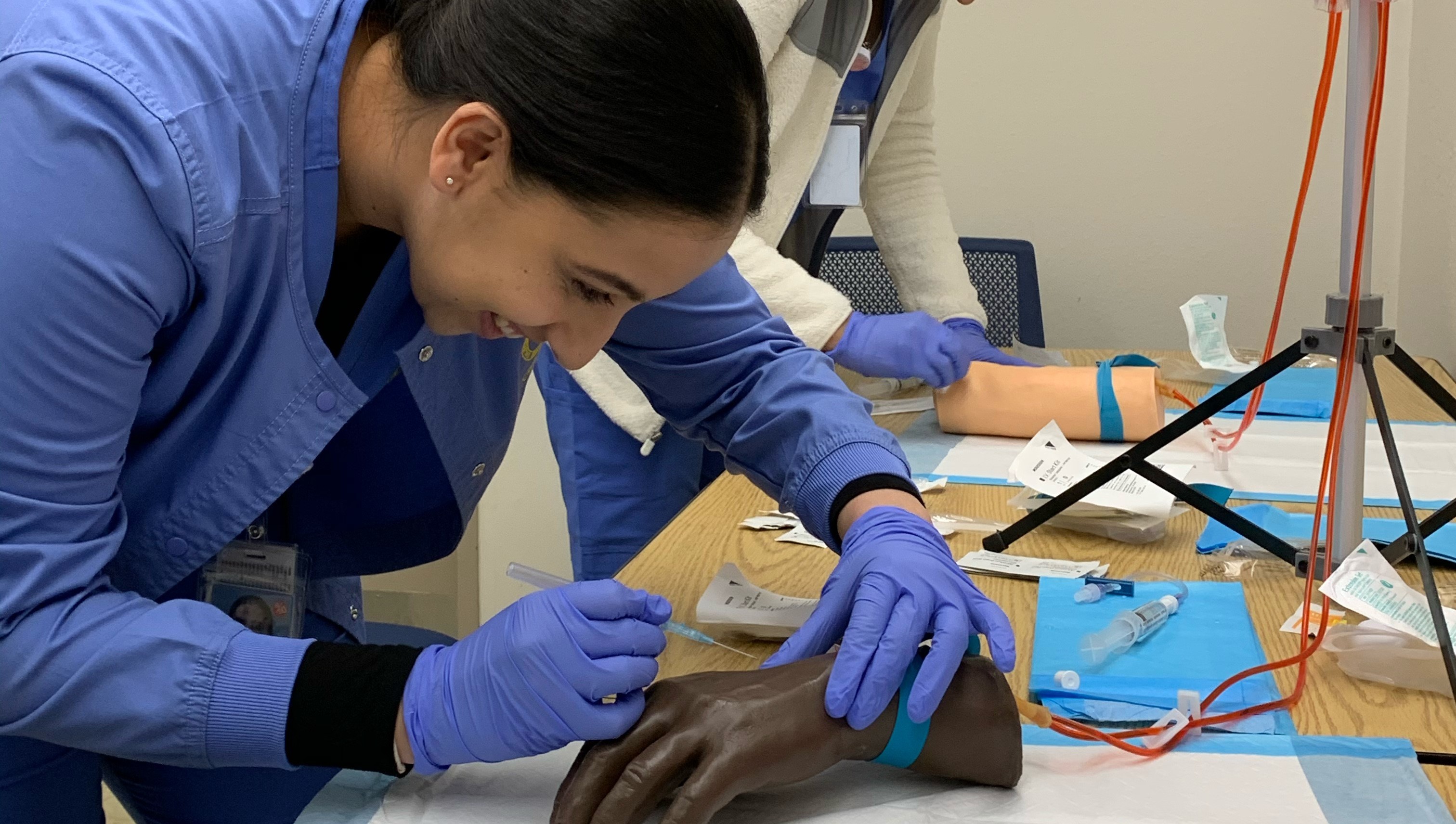 Student practicing their IV skills