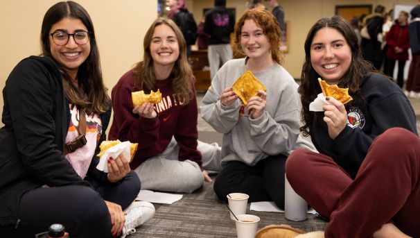 Students enjoy their grilled cheese and snacks in Newman Library.