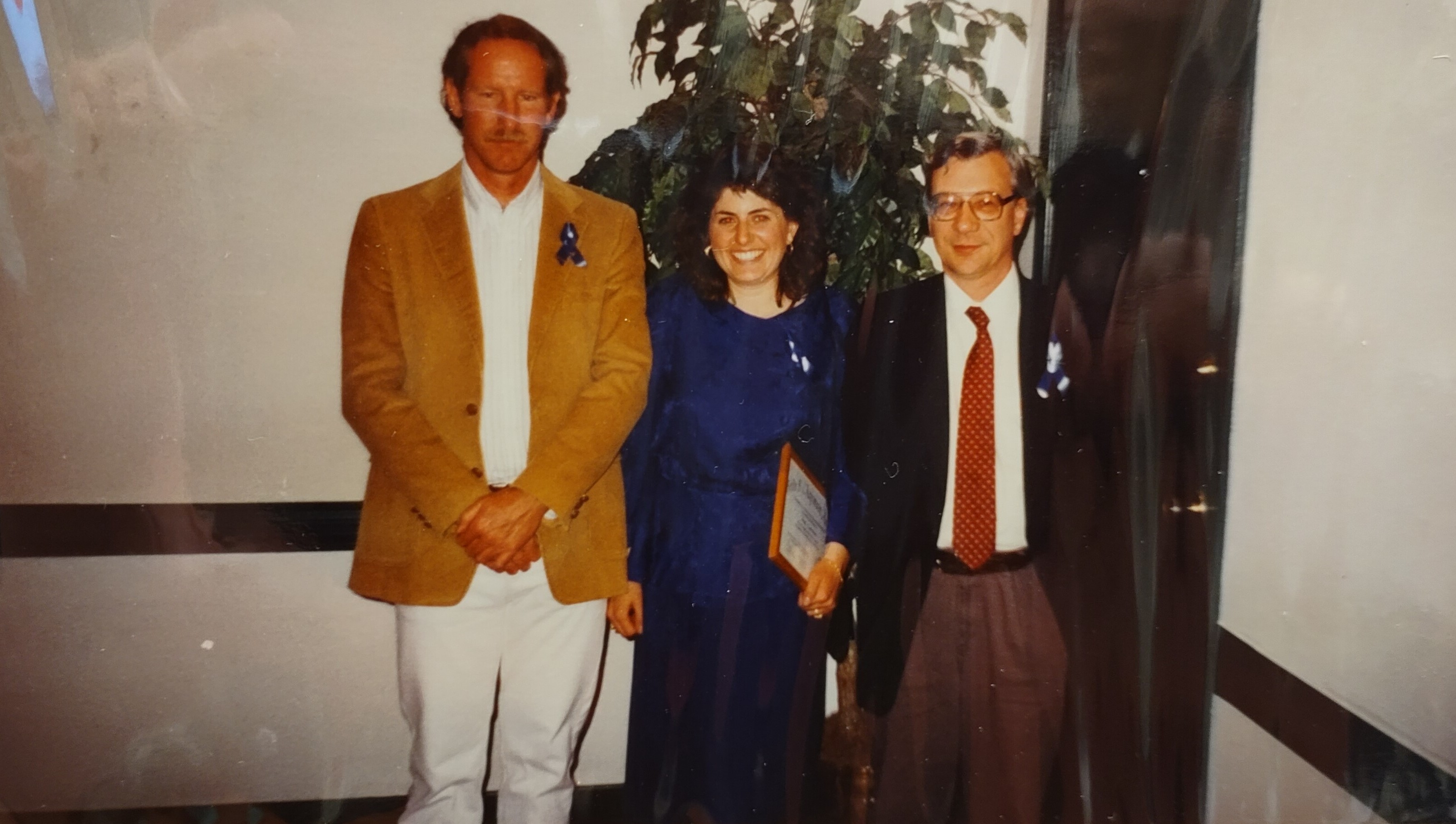 Dr. Mike Logan, Amy Carreiro, and Dr. Petrin at a Phi Alpha Theta banquet, sometime in the 1990s.