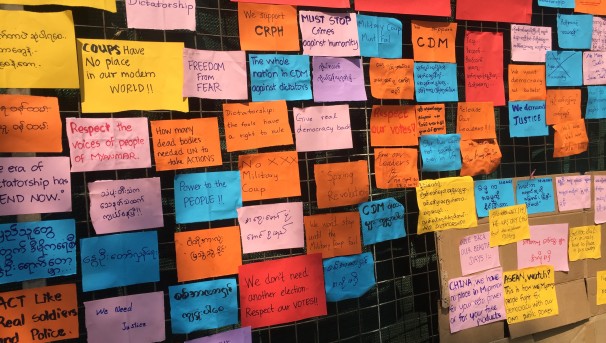 A wall of sticky notes expressing support for the anti-coup protests