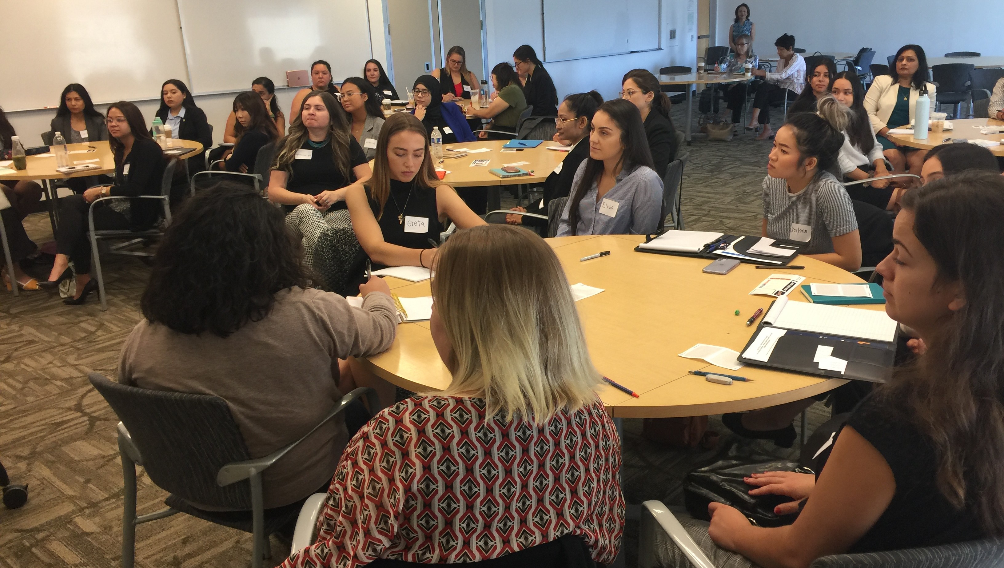 Students in a live Women's Leadership Program workshop