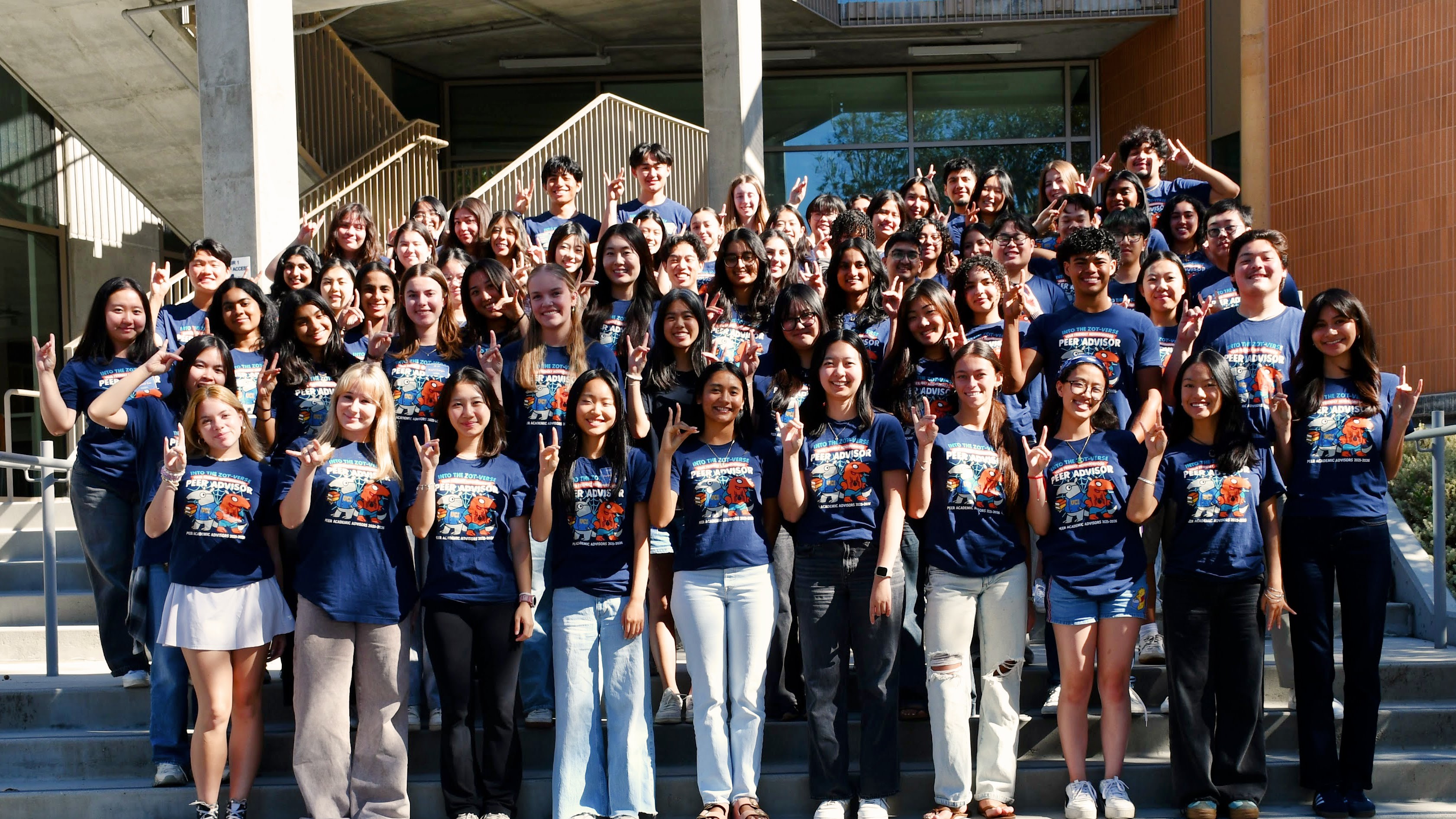 2025-26 PAAs group photo with all members holding the "zot" hand sign