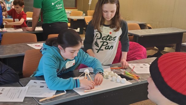 Two young students working on a project