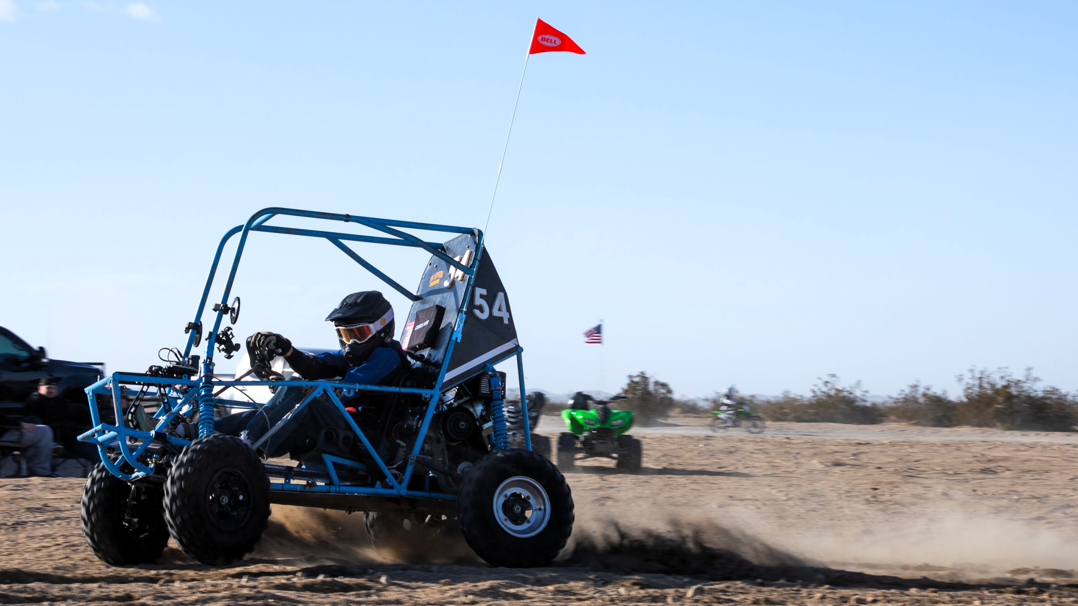 Desert vehicle testing day, Corsair driving over sandy terrain