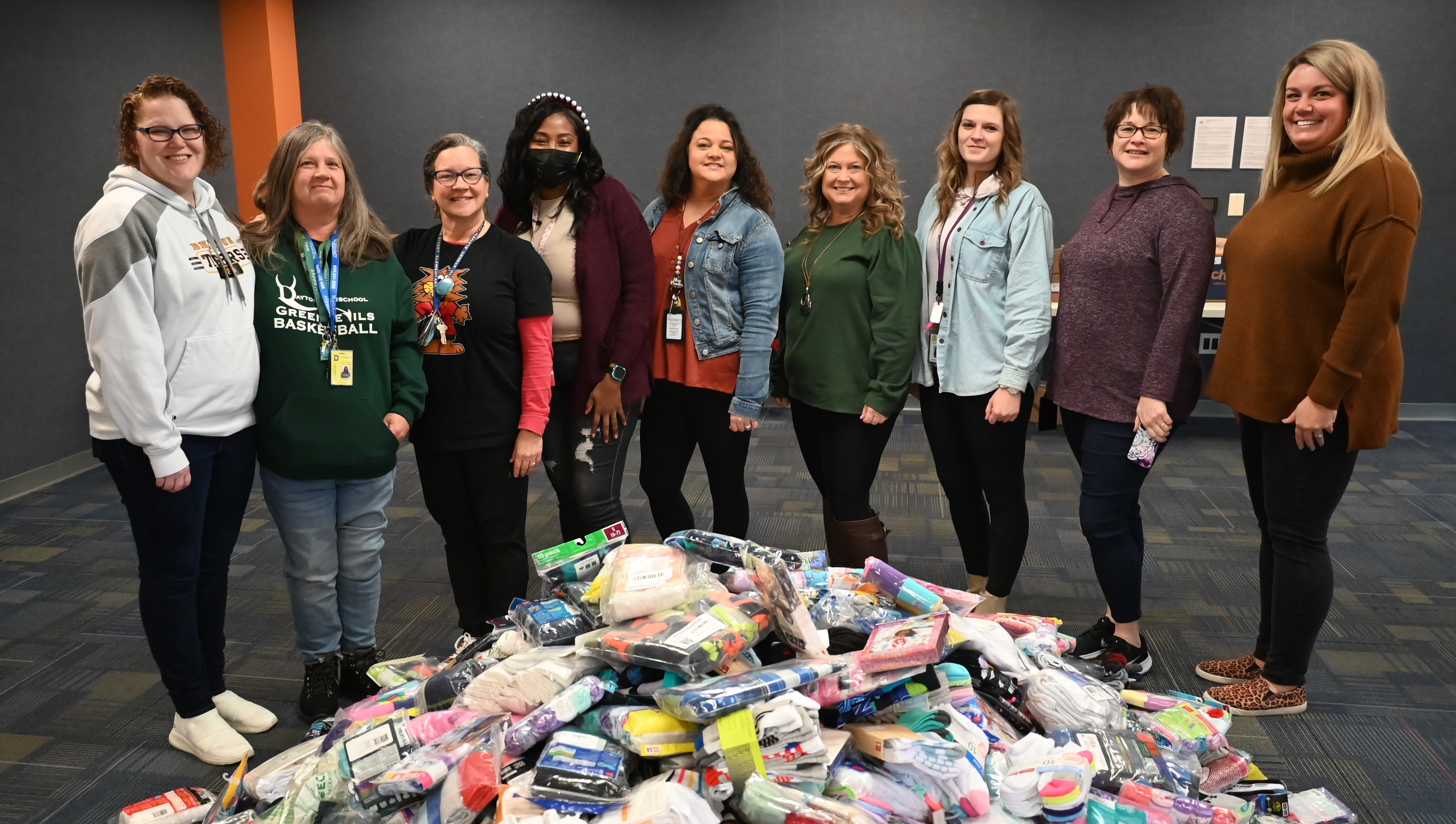 Library Staff and Volunteers with a pile of donated underwear and socks!