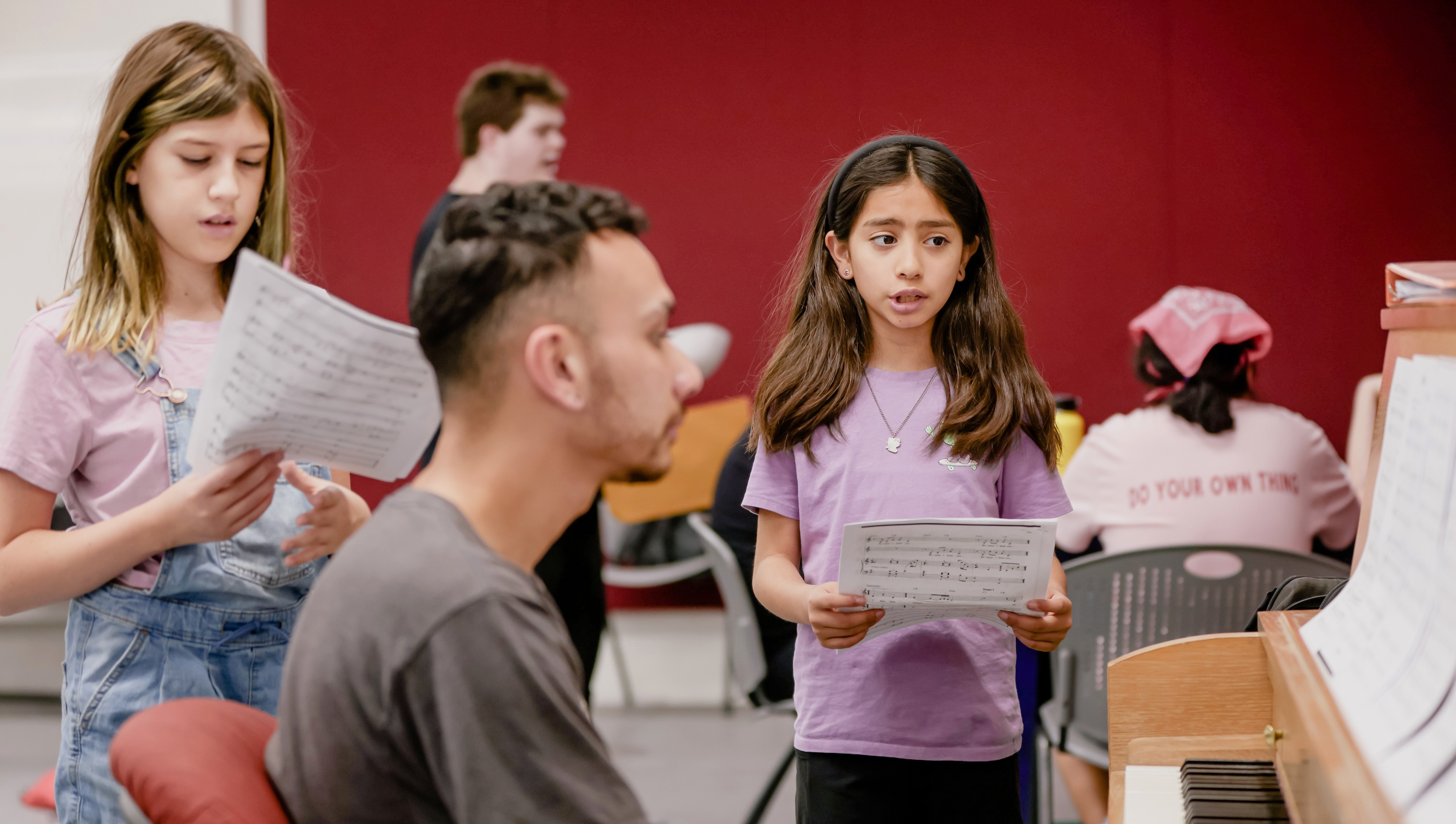 Two students rehearse a song from Wicked in preparation for our Musical Theatre Showcase.