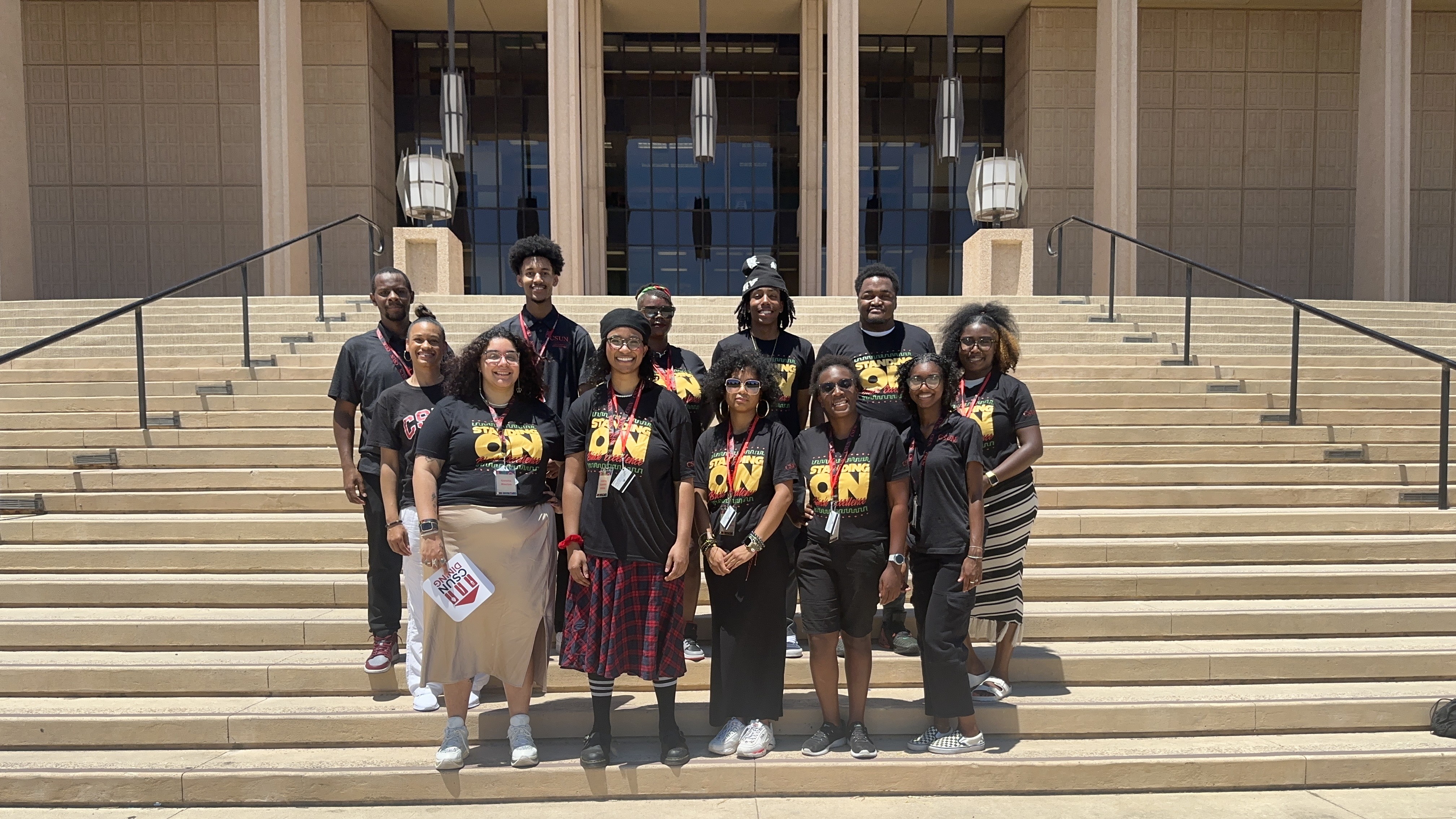 Black House staff and mentors stand together supporting student leadership and unity.