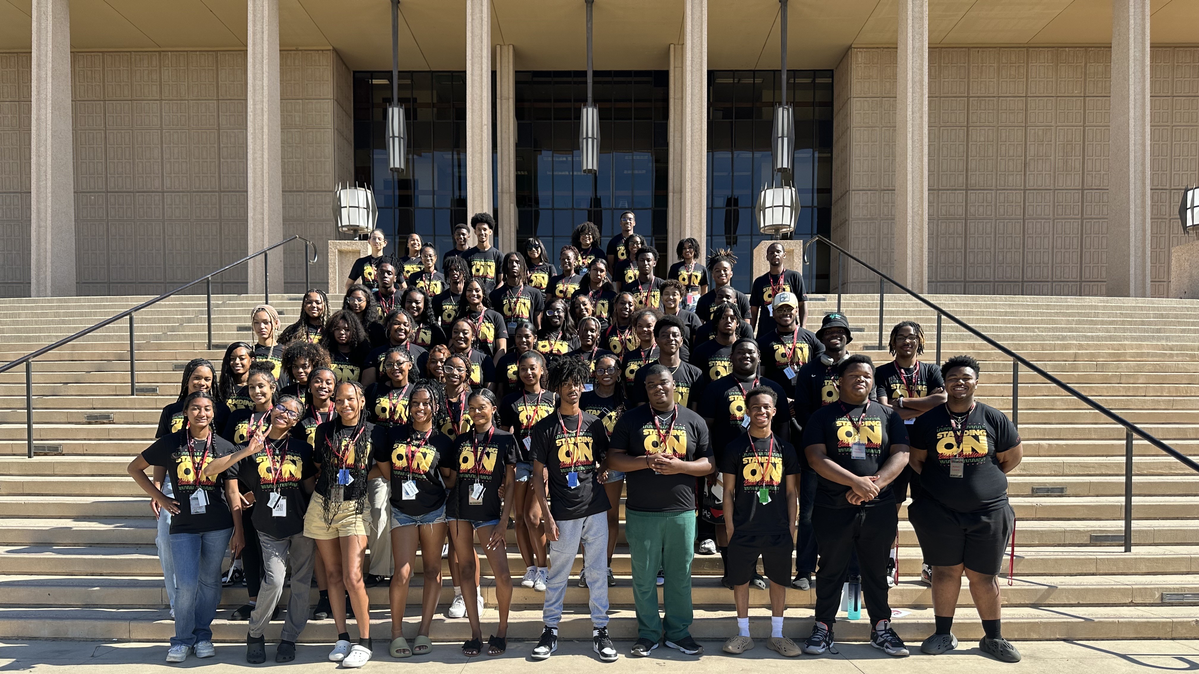 Black House participants pose on the Oviatt Library steps during a summer bridge program.