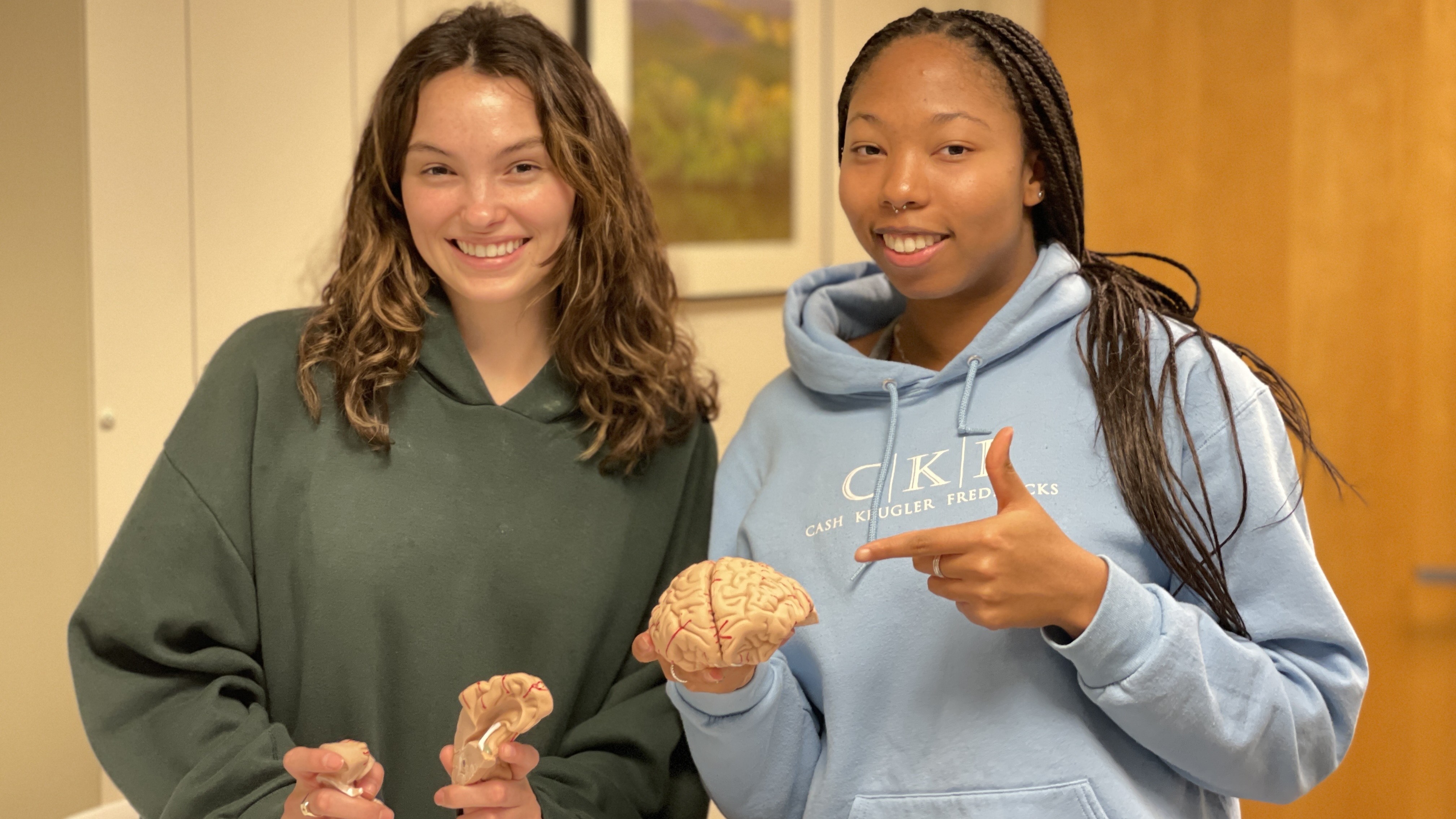 Neuroscience students with a model brain