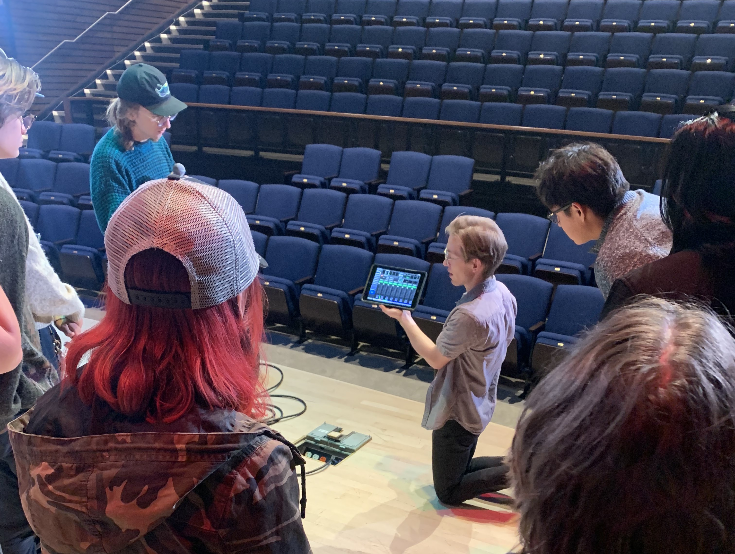 AEC members recieving a tour of the facilities in NAU's Kitt Recital Hall.