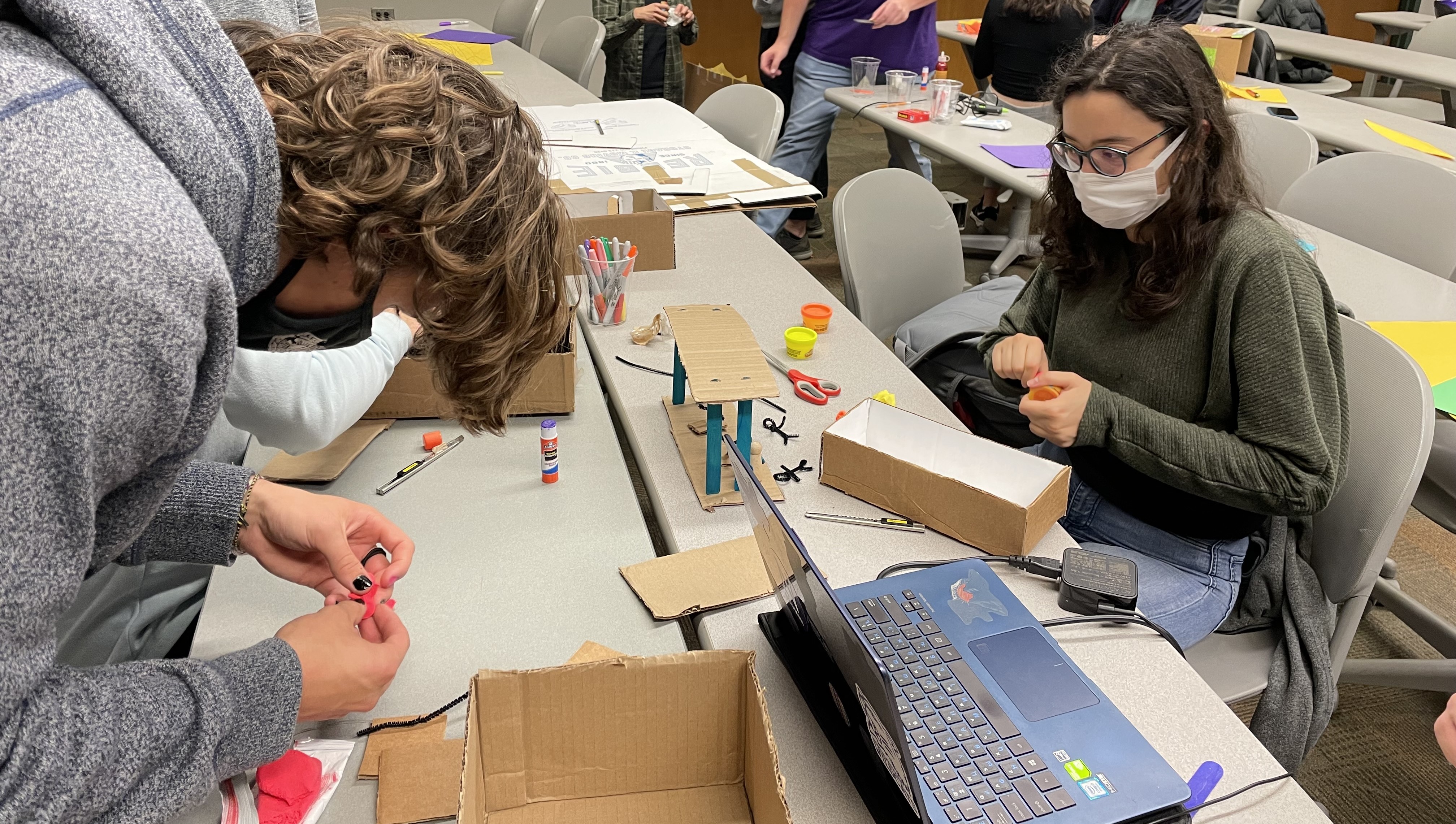 TPED members working on a Haunted House modeling project