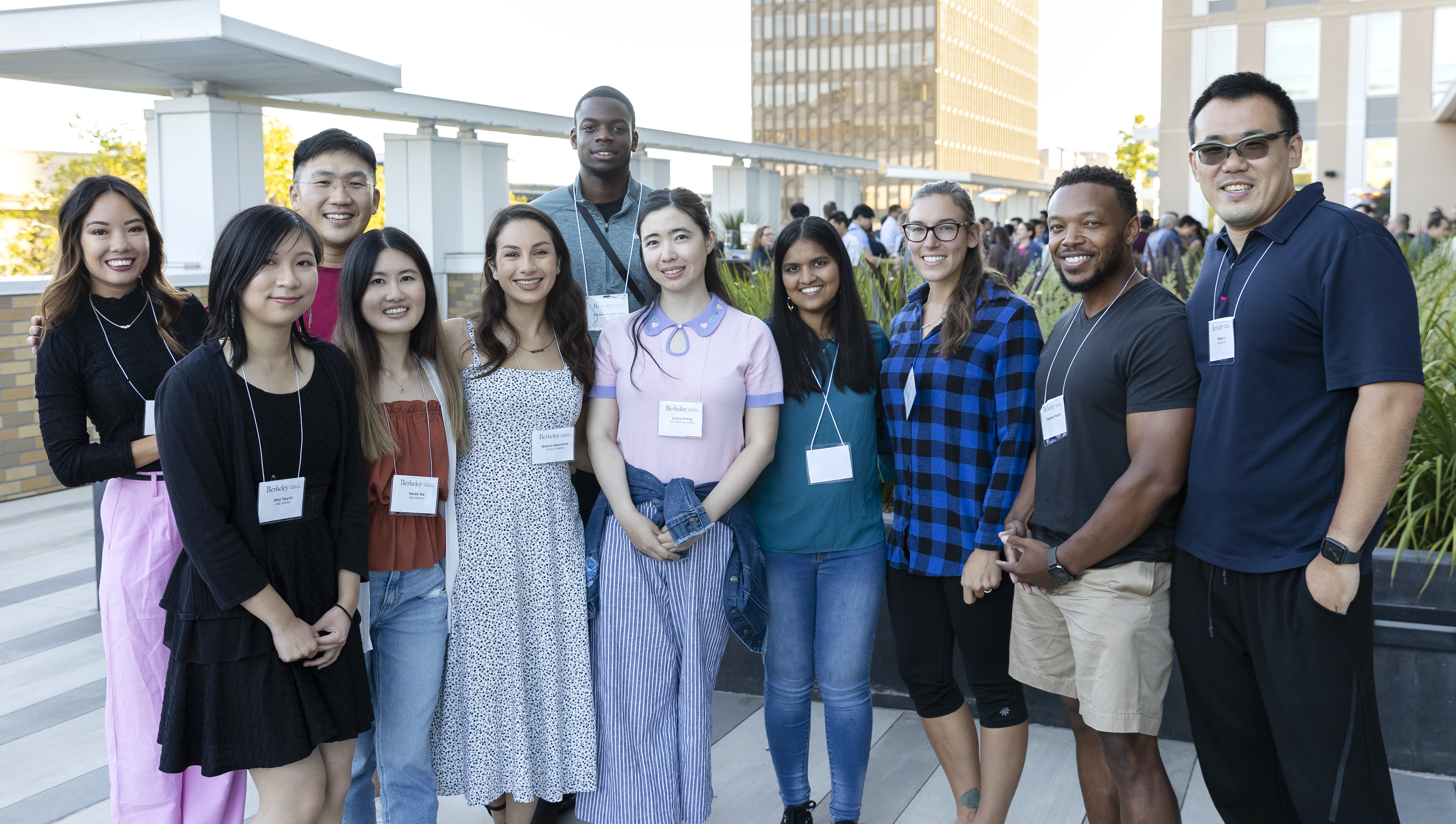 Group of I School students at a rooftop celebration