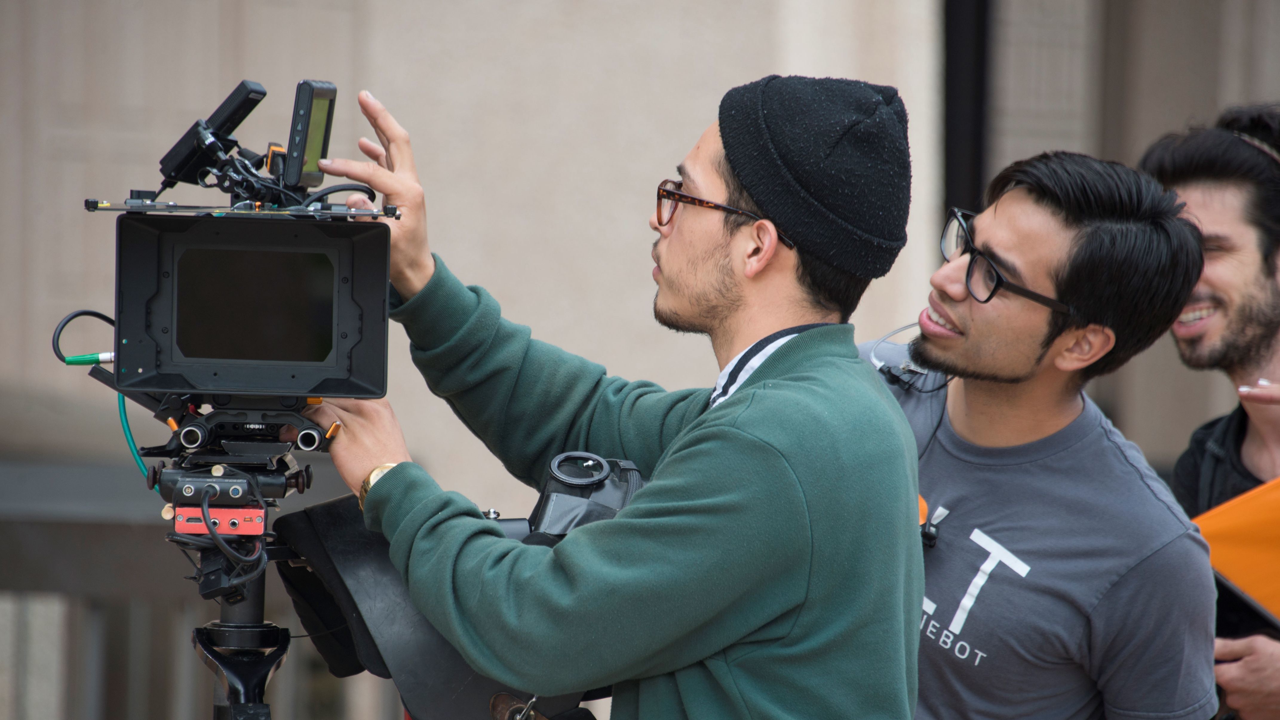 Students collaborate on professional video shoot through EII-supported training.