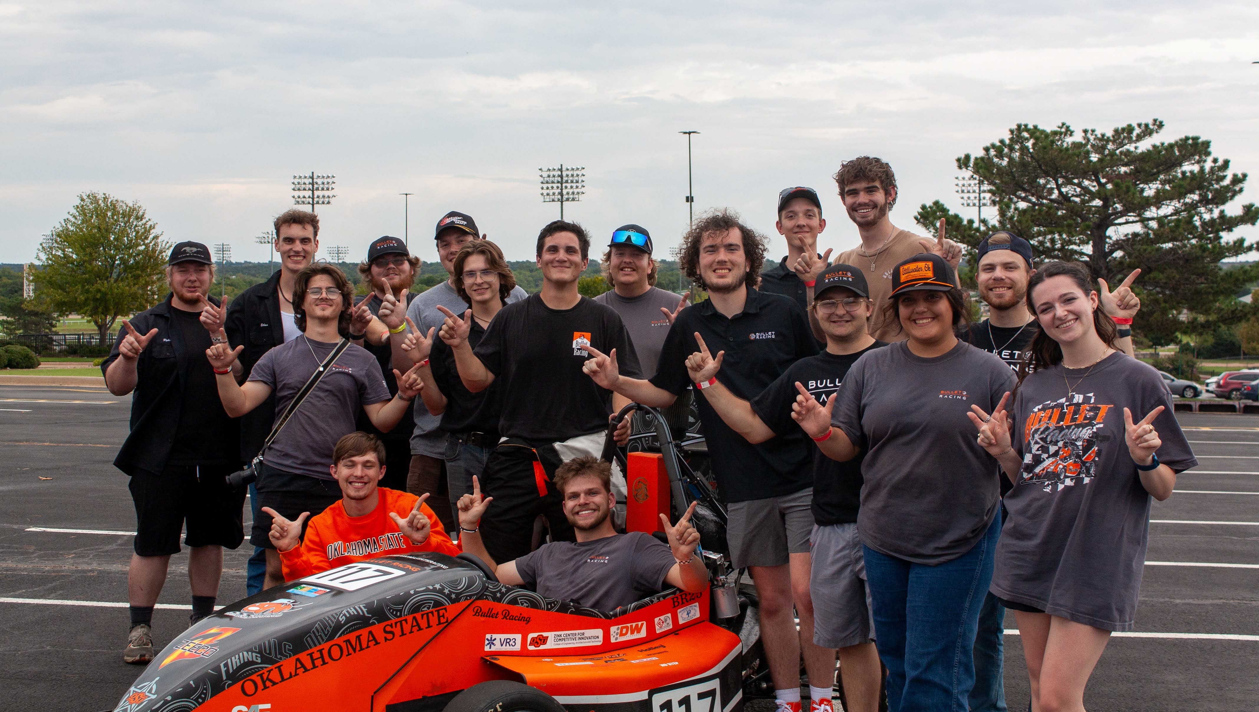 Bullet Racing team members celebrating after competing in the Oklahoma SCCA Autocross event!