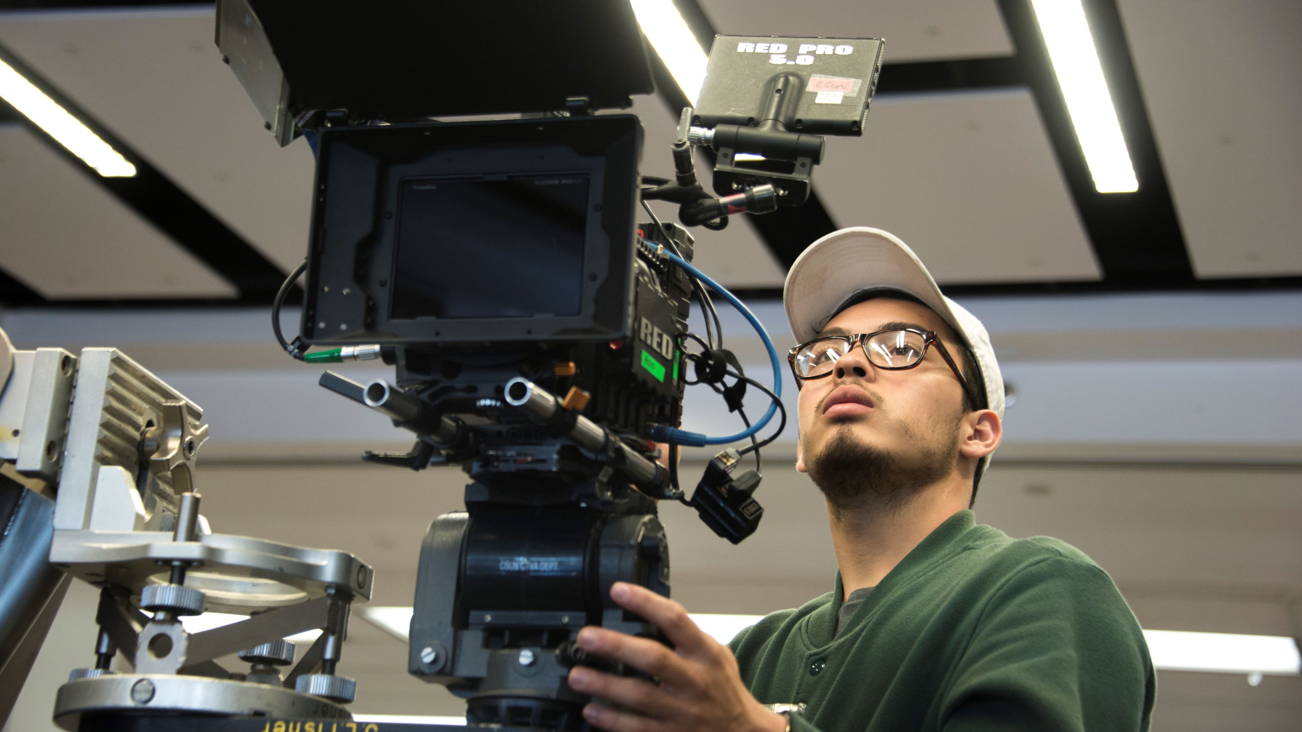 Camera operator in studio.