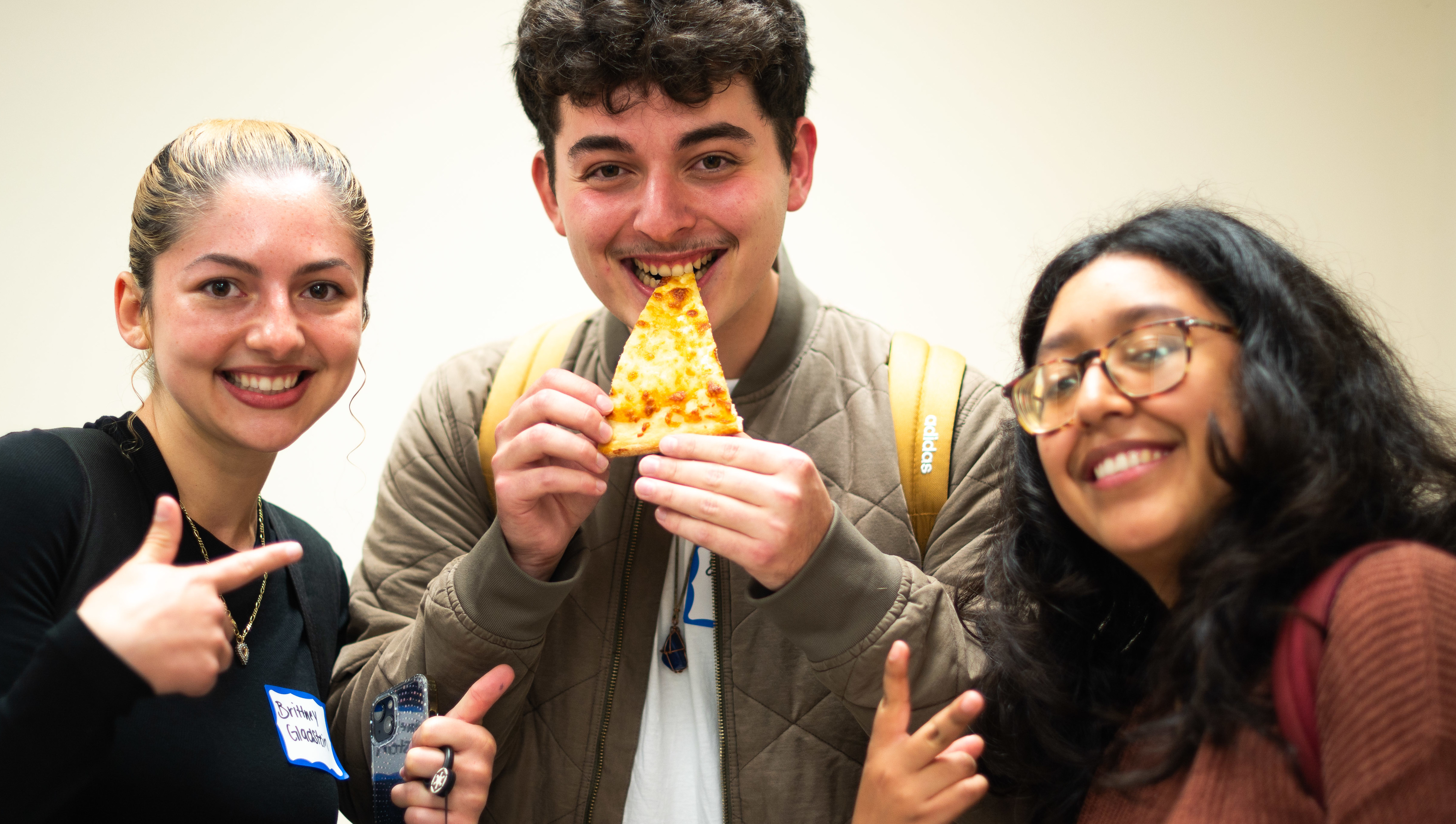 BSPers enjoying pizza together at a student event.