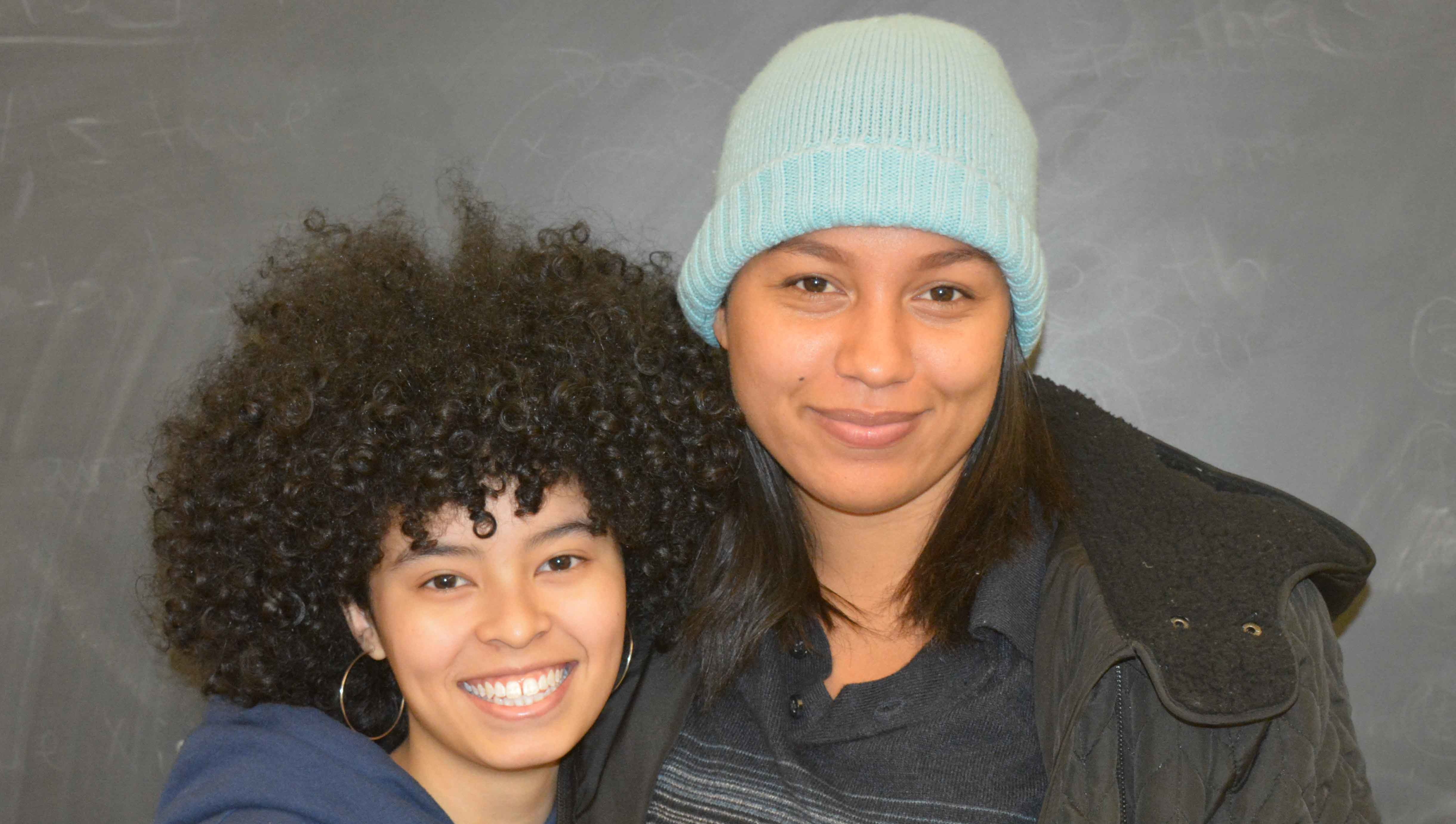 Two smiling Berkeley Connect students pose for the camera.