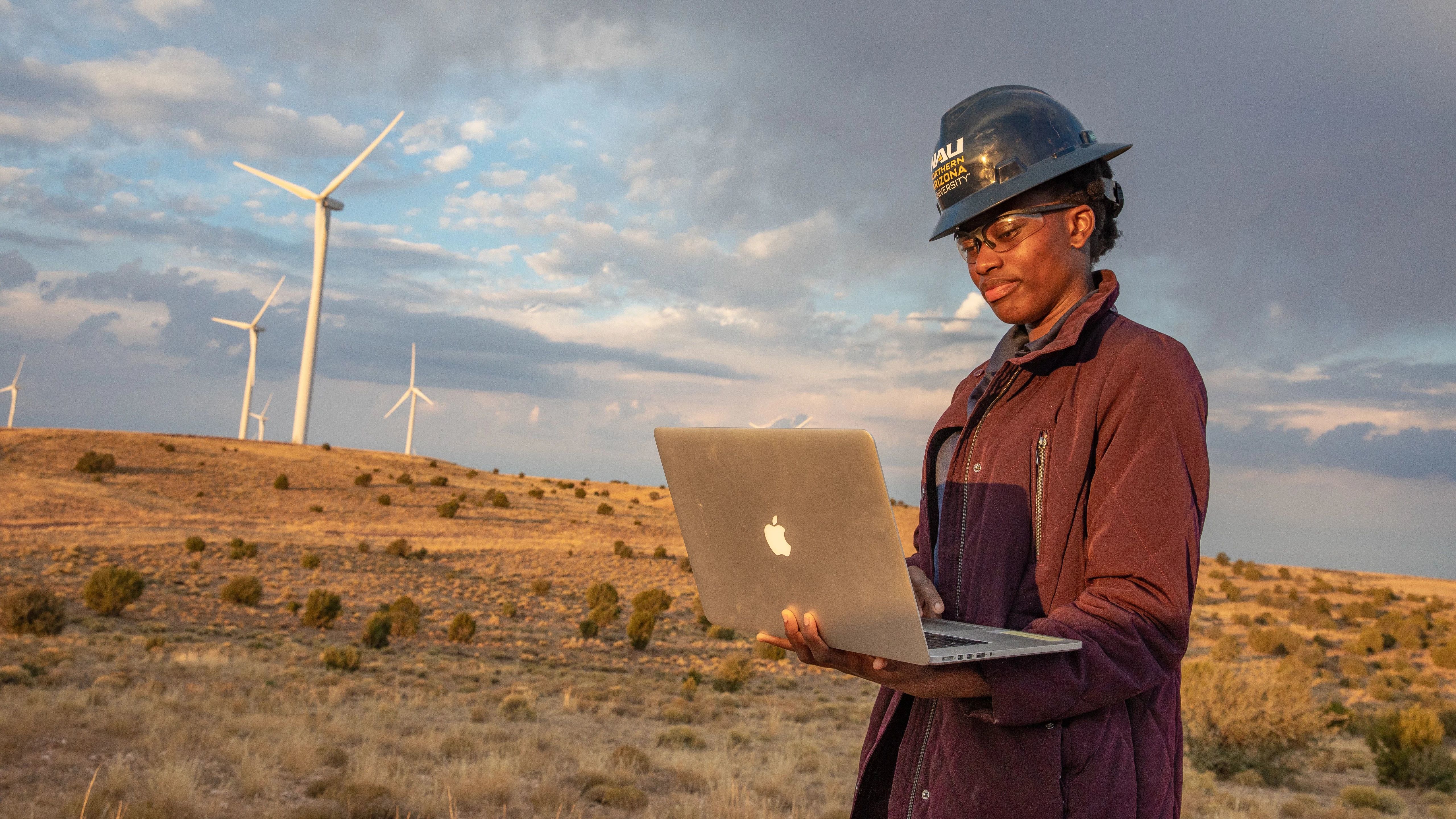 Student at a windfarm