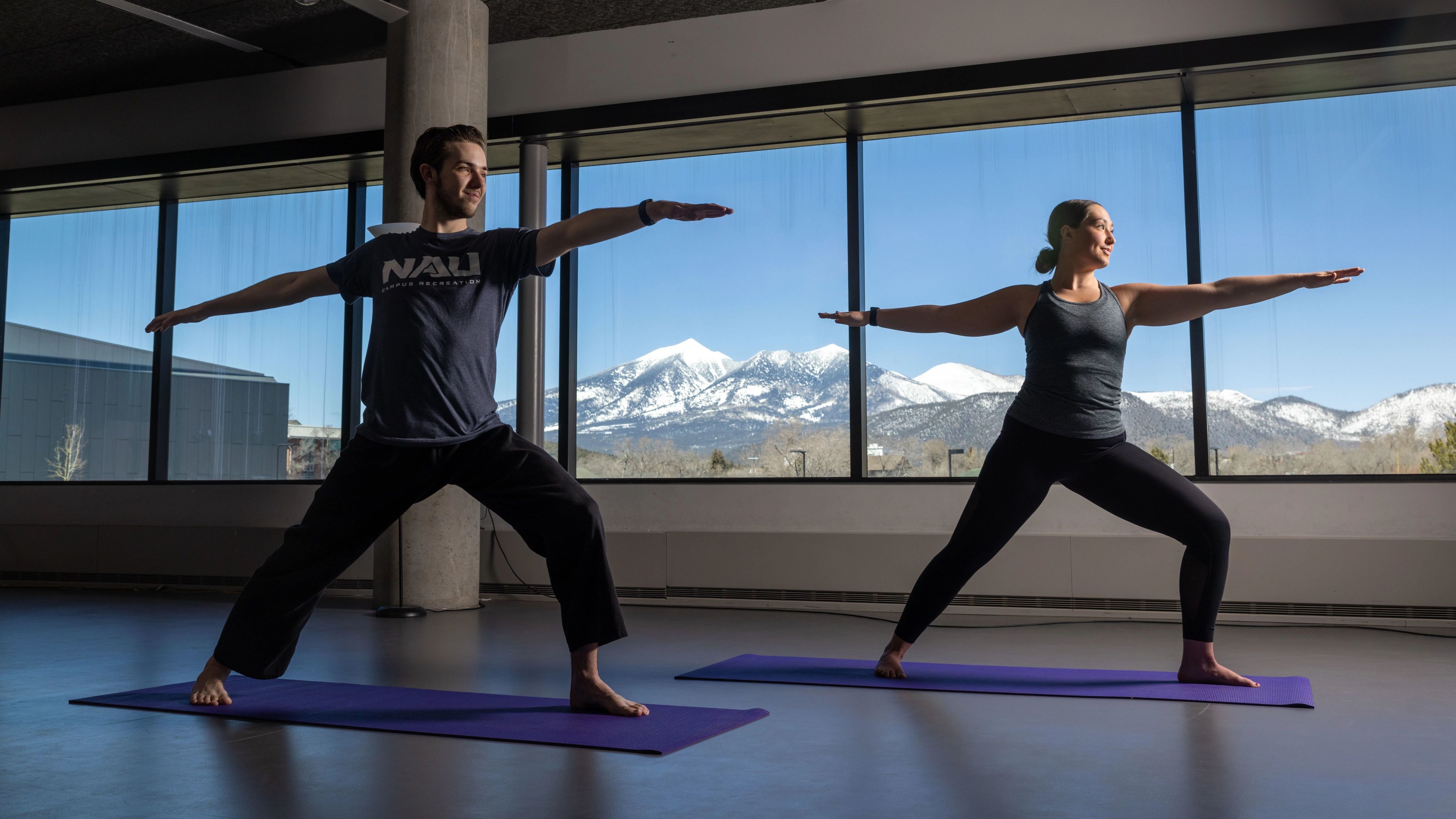 Students practicing yoga