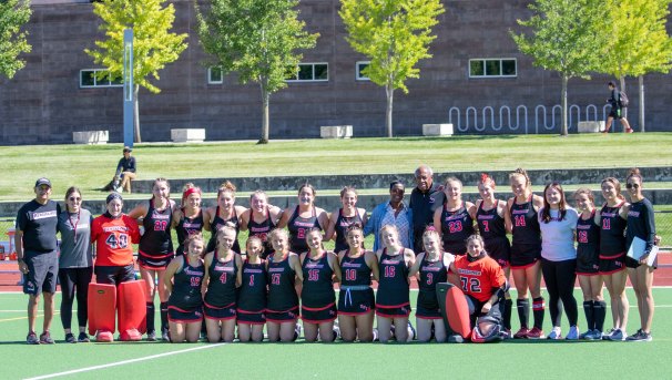 RPI Field Hockey team members lined up on the field.