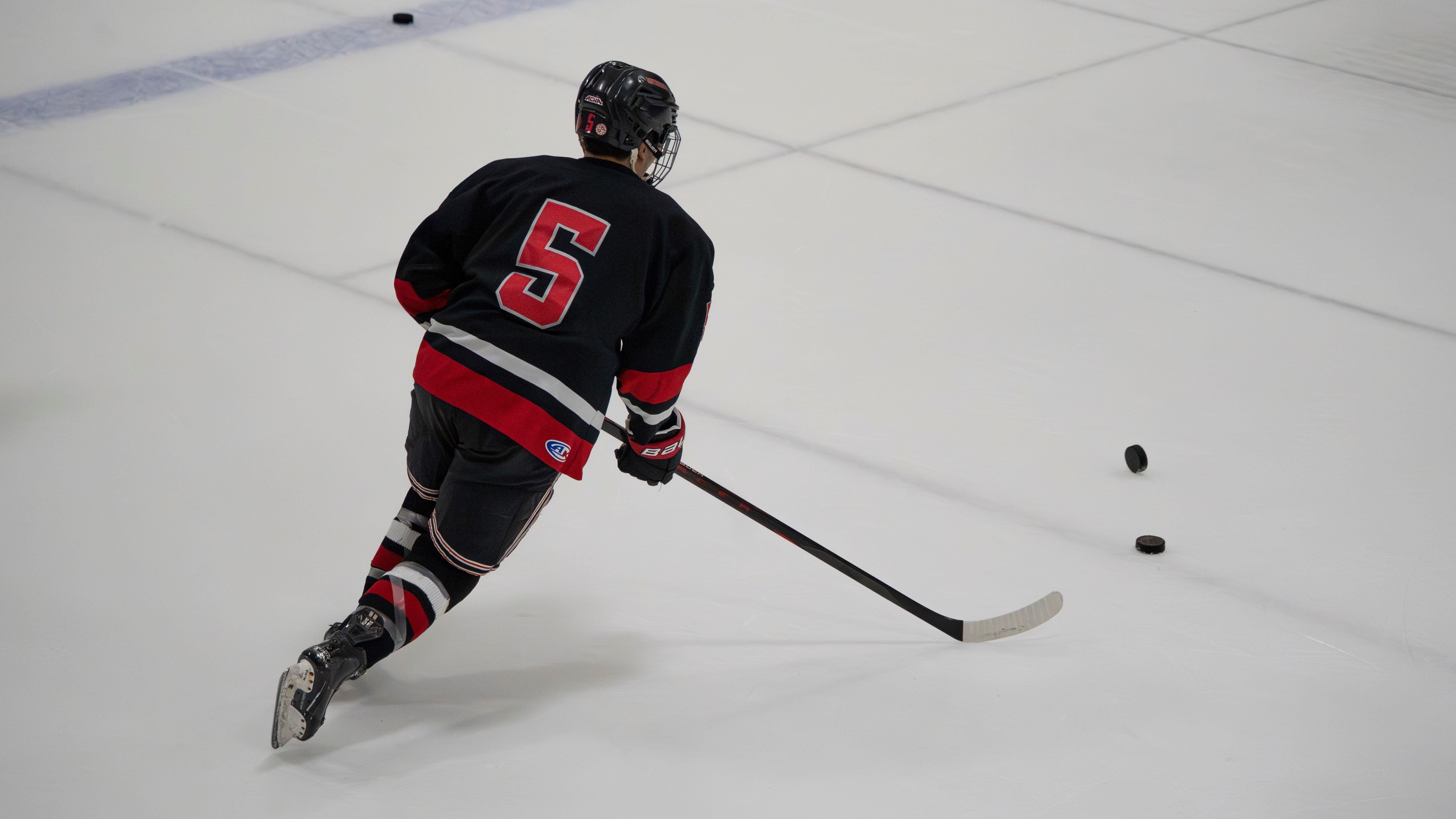 Person playing ice hockey