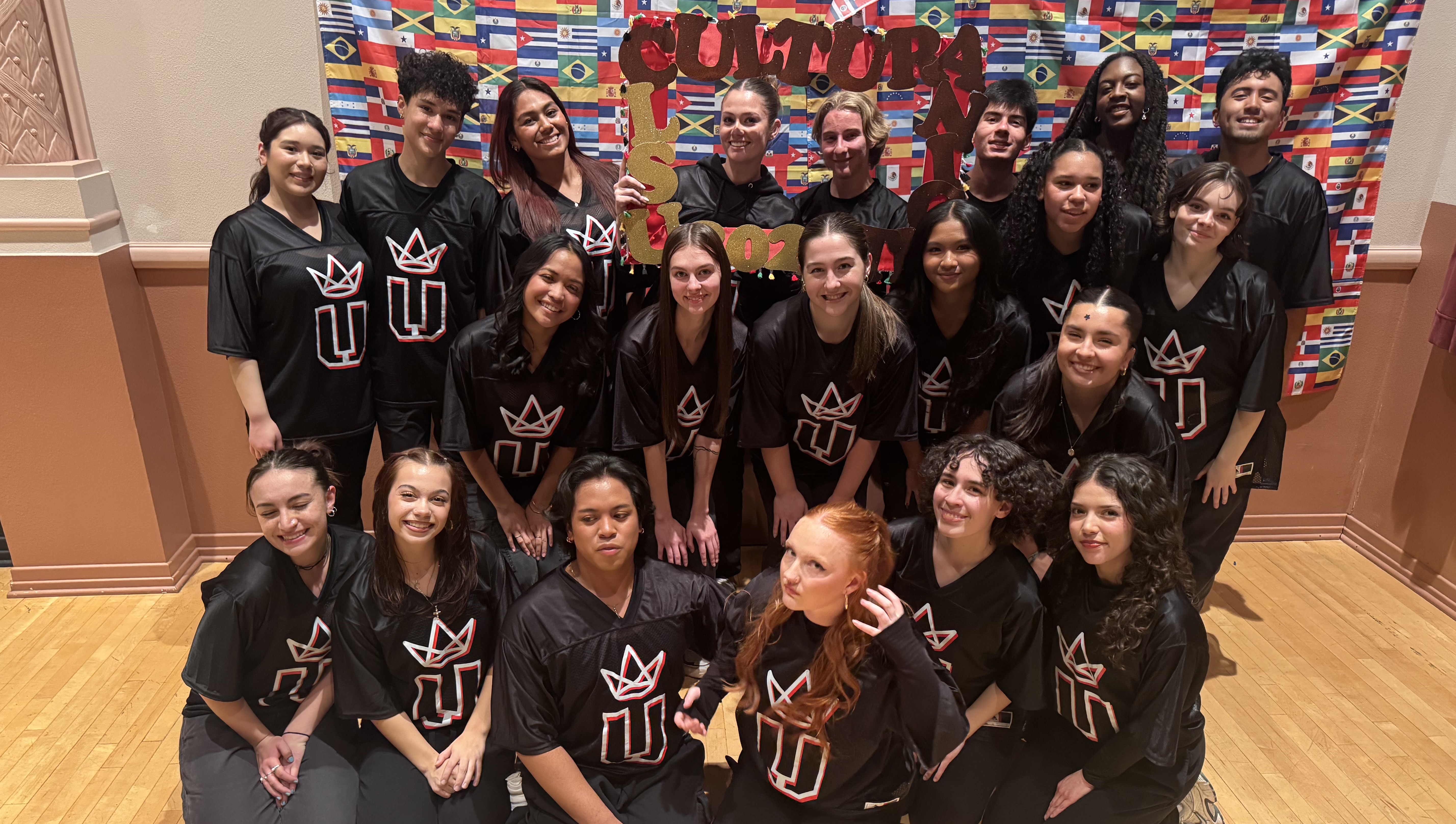 Unity Dance Team poses together as a group after a competition.