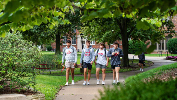 Central College students walking through campus